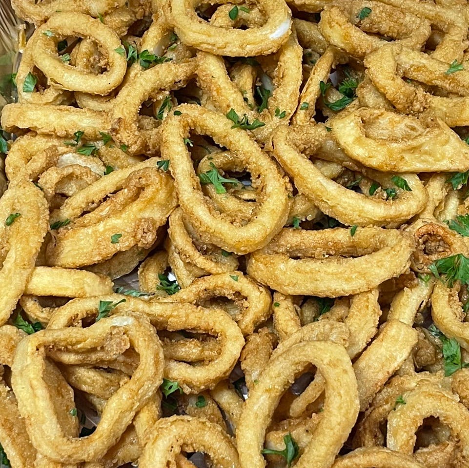 Order Fried Calamari Catering - Half Tray food online from Davila's Pizza & Restaurant store, Hackettstown on bringmethat.com