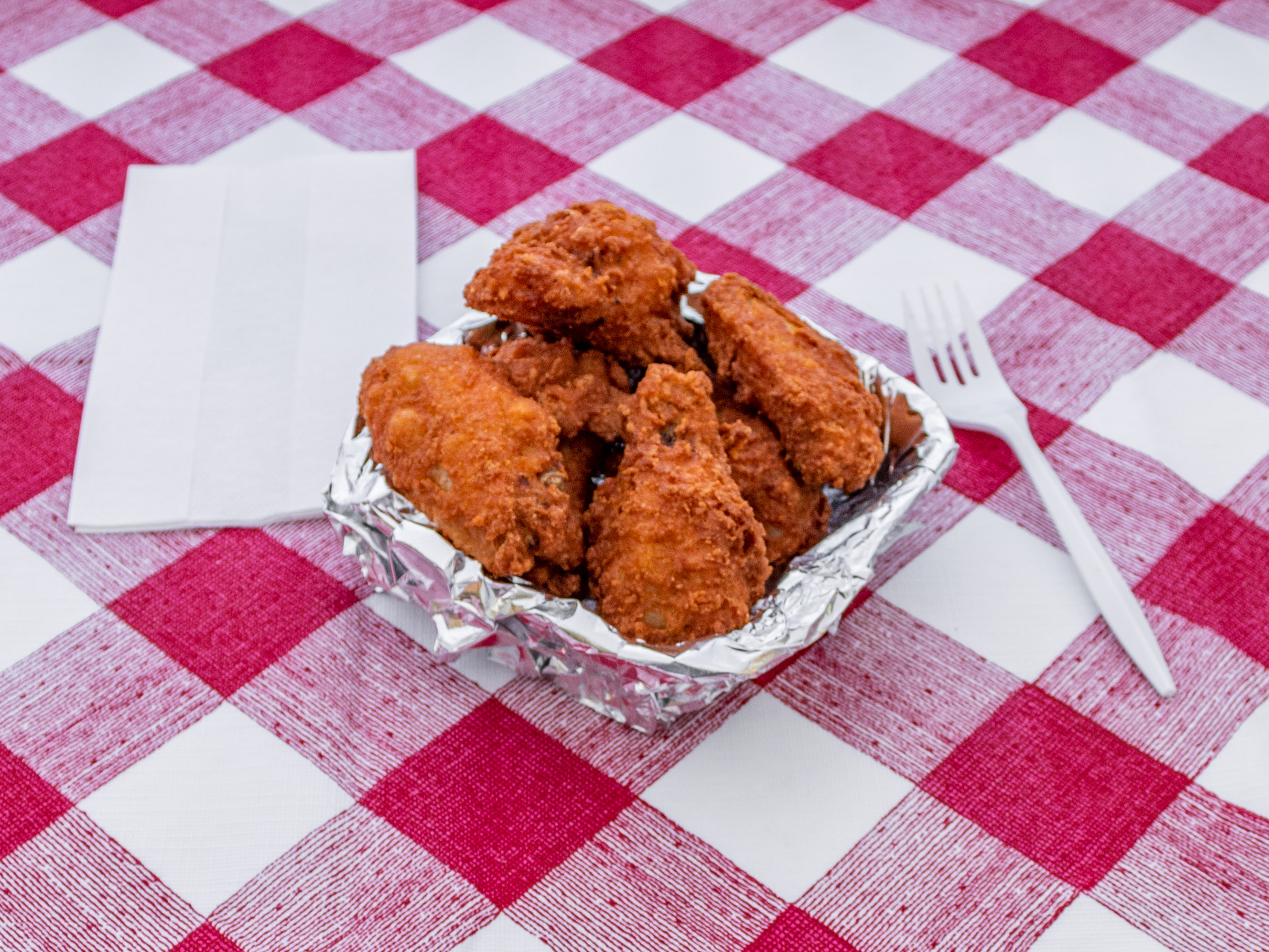 Order 6 pcs Hot Wings food online from Crown Fried Chicken store, Philadelphia on bringmethat.com