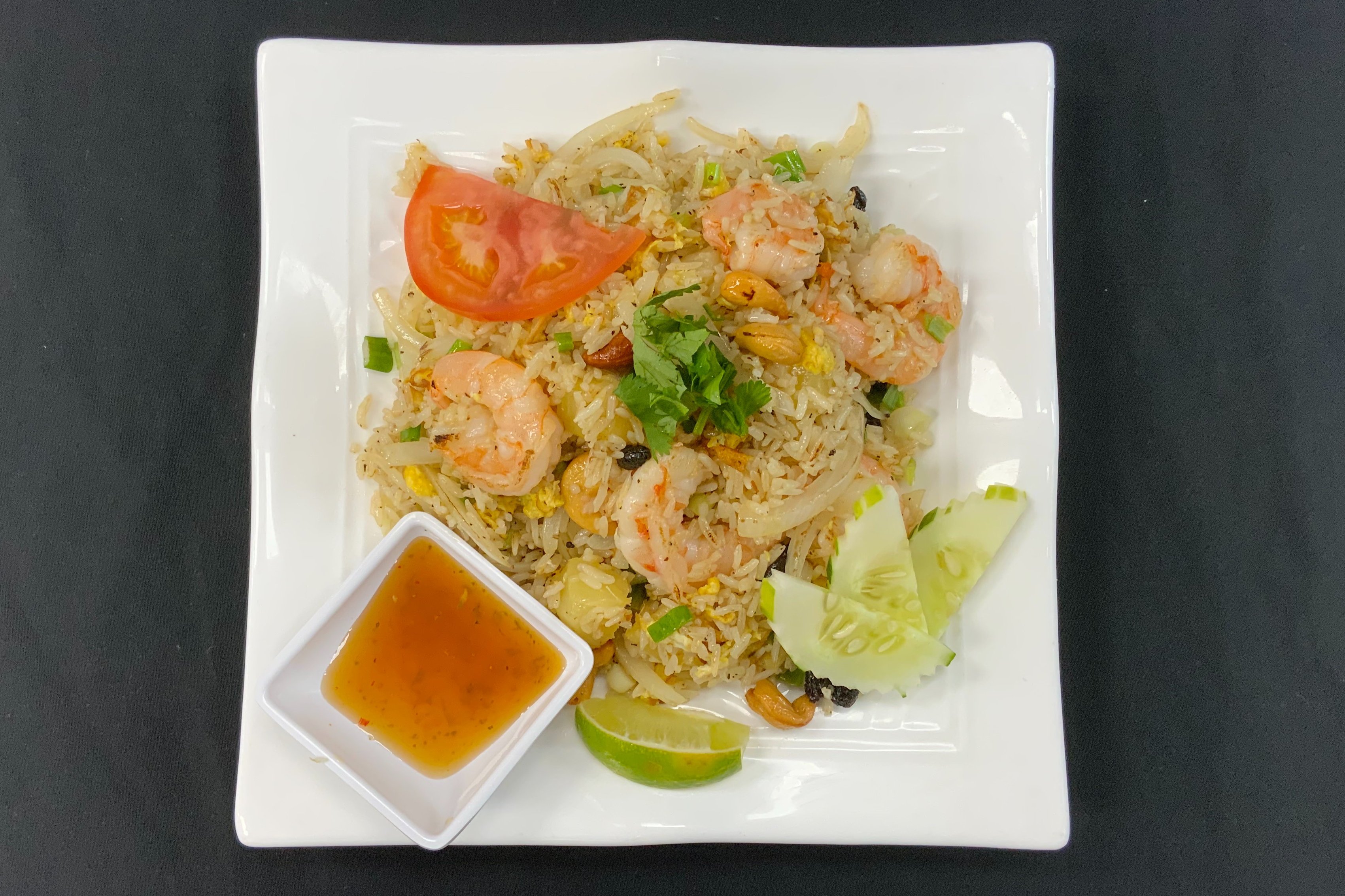Order Pineapple fried  rice ( chicken ＆shrimp ) food online from Rai Lay Thai Cuisine store, Charlotte on bringmethat.com