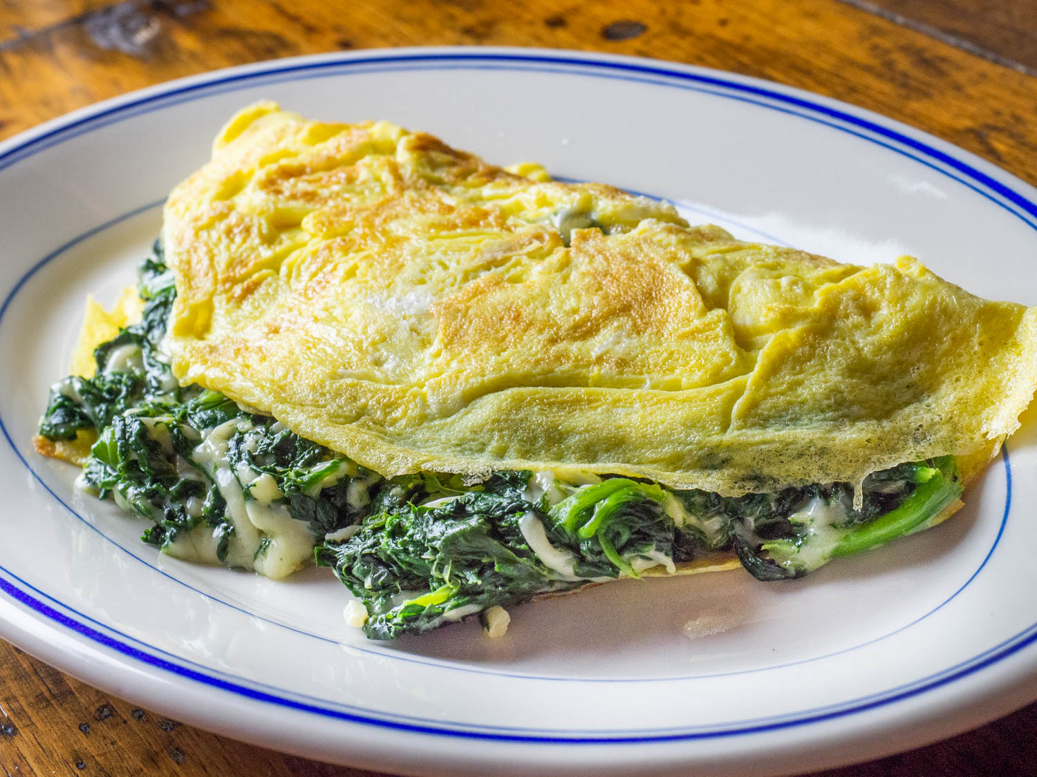 Order Florentine Omelette food online from Jackson Hole store, Englewood on bringmethat.com