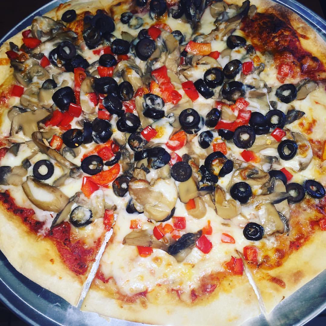 Order Veggie Deluxe Pizza food online from Kava Coffee House store, Howell Township on bringmethat.com
