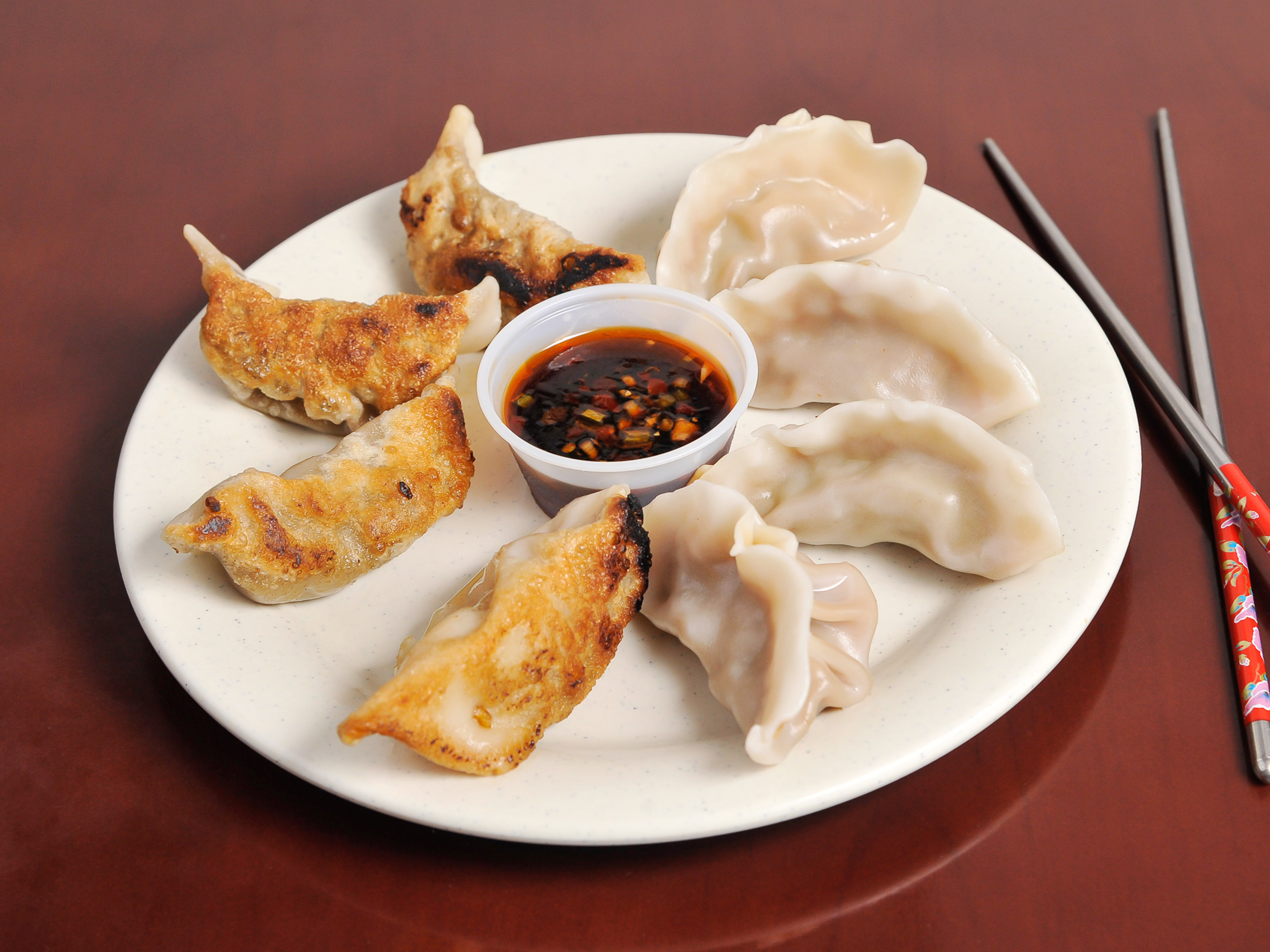 Order A4. Fried Chinese Dumplings food online from Happy Panda store, Kennesaw on bringmethat.com