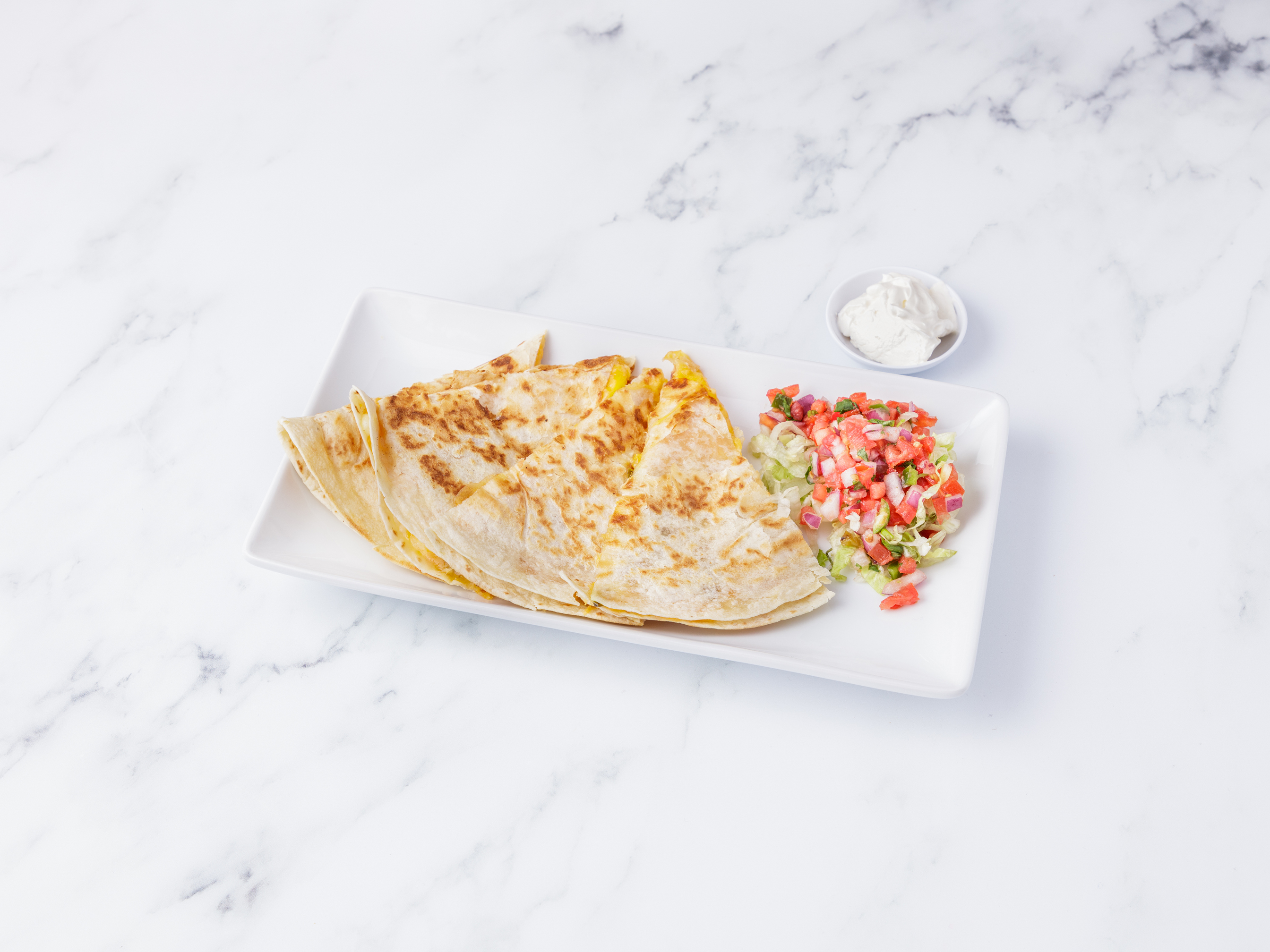 Order Quesadilla food online from The Silver Iguana store, Rochester on bringmethat.com