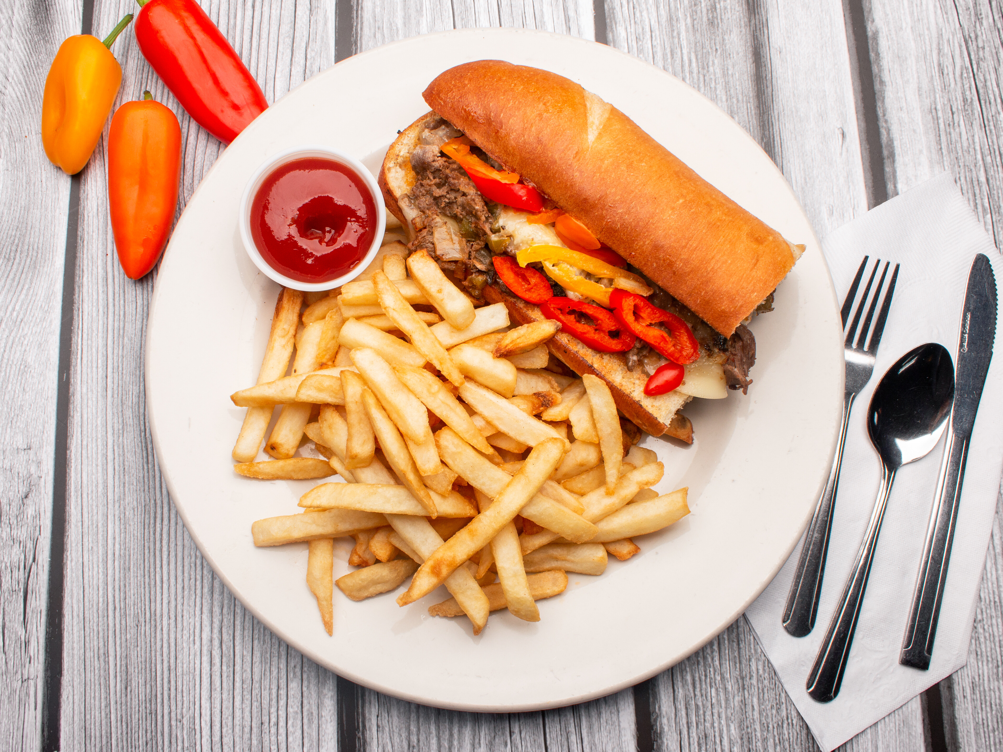 Order Philly Cheese Steak Sandwich food online from Cafe 360 store, Louisville on bringmethat.com