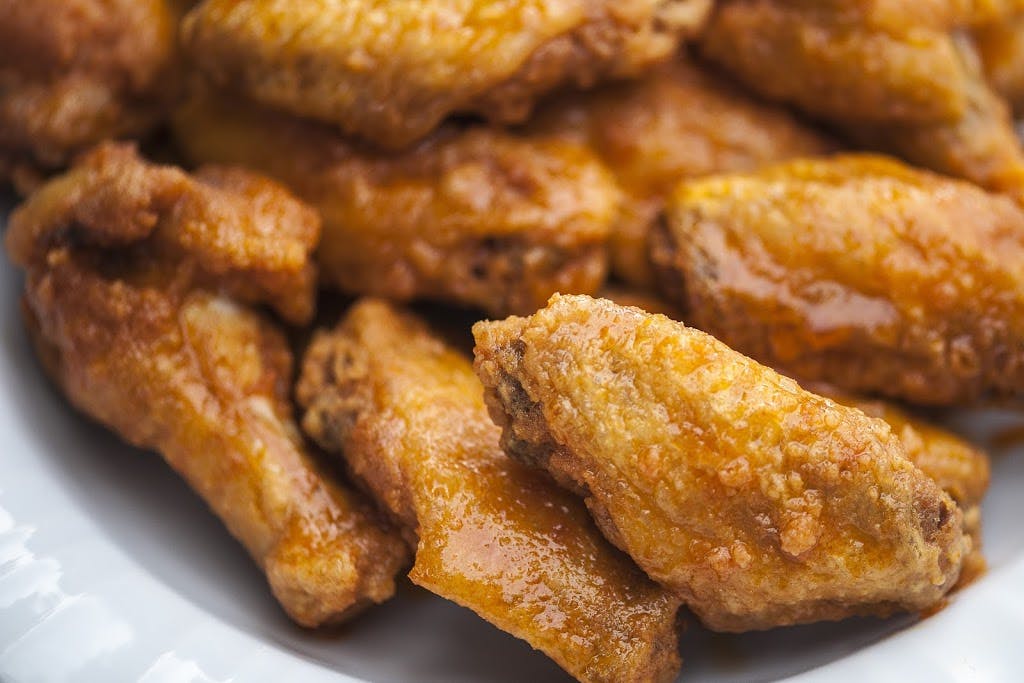Order Wings - 10 Pieces food online from Premiere Pizza store, Delmont on bringmethat.com