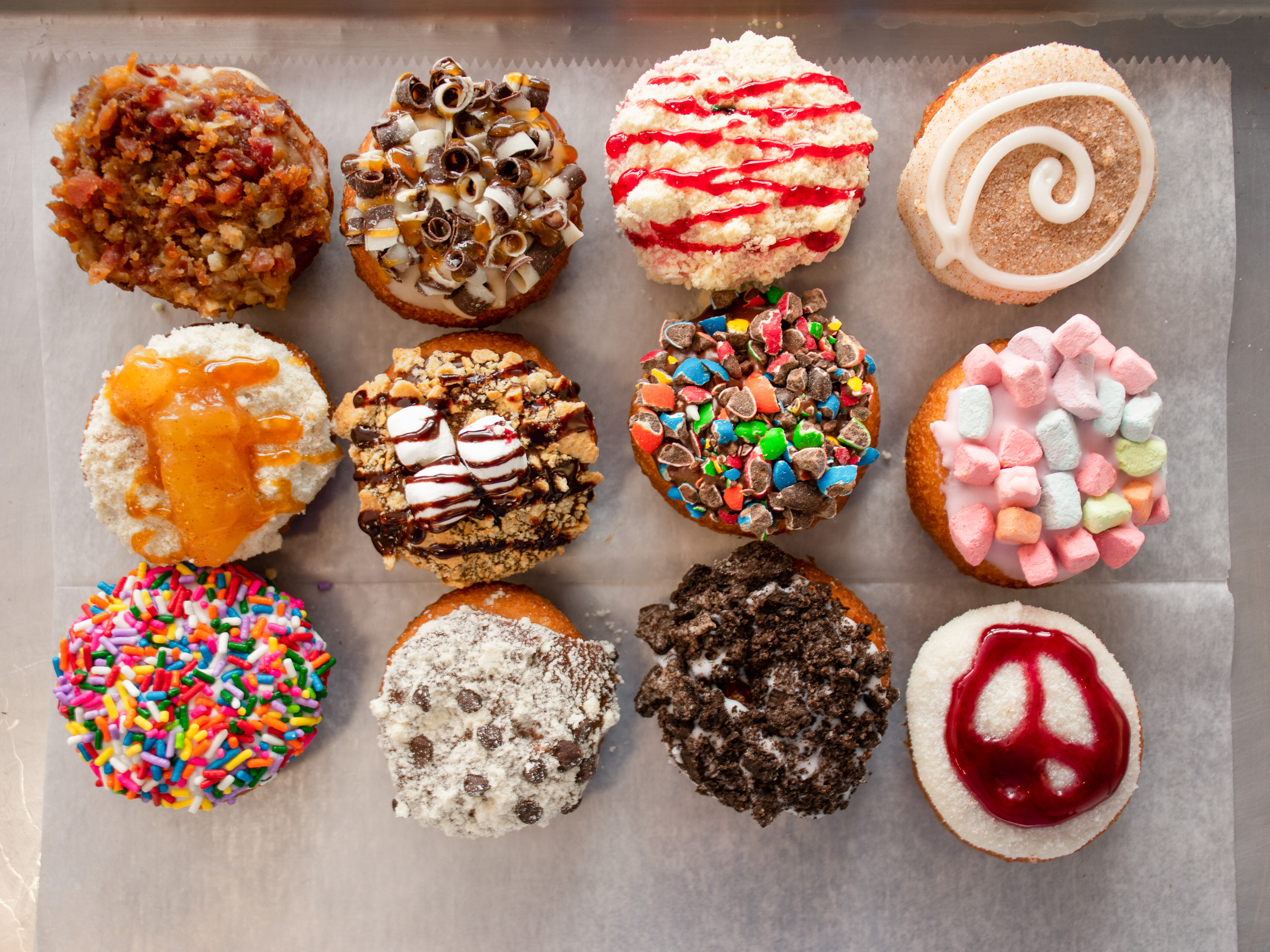 Order 1 Dozen Assorted food online from Donut Connection store, Shakopee on bringmethat.com