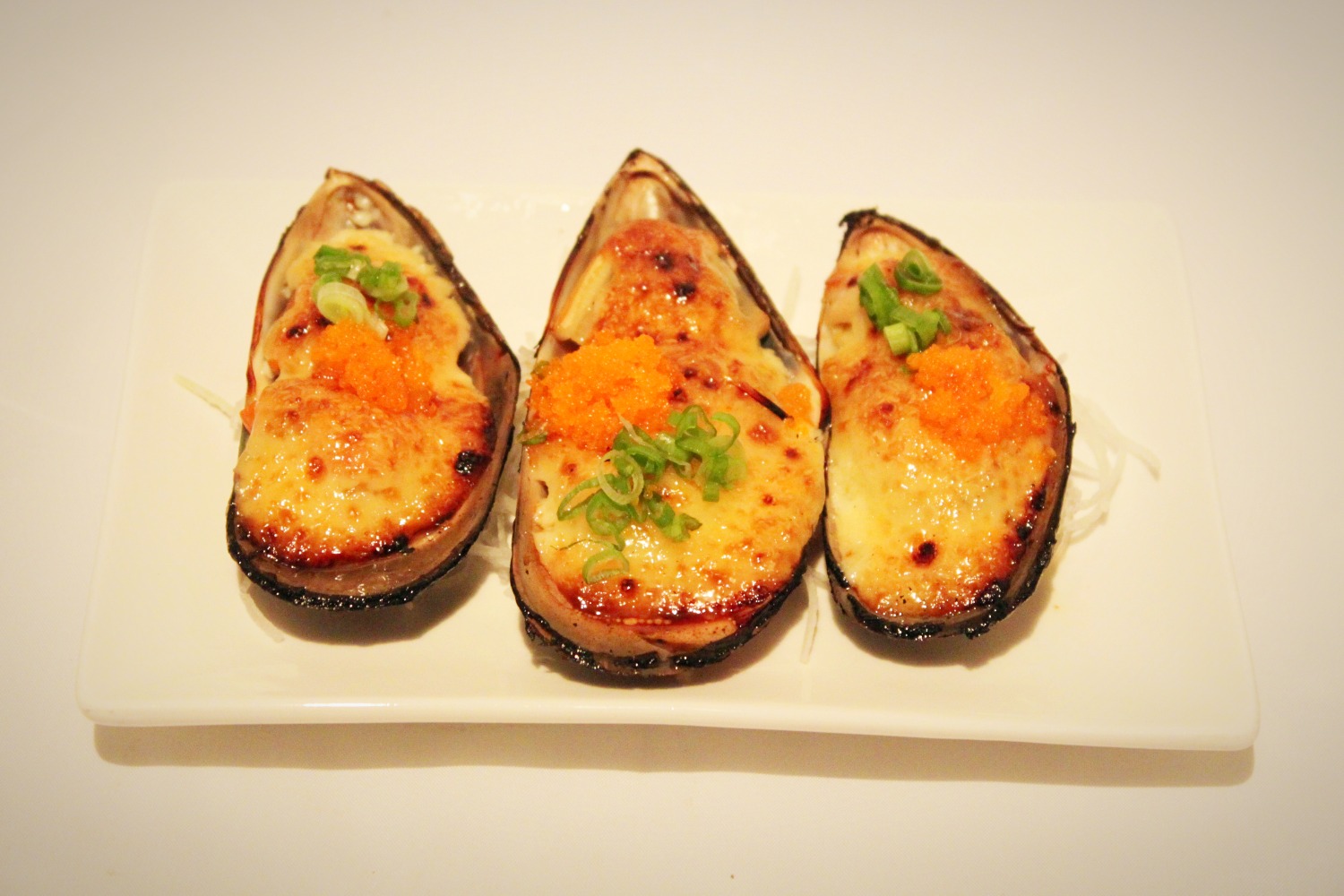Order Baked Green Mussels food online from Shogun Sushi store, Santa Clarita on bringmethat.com