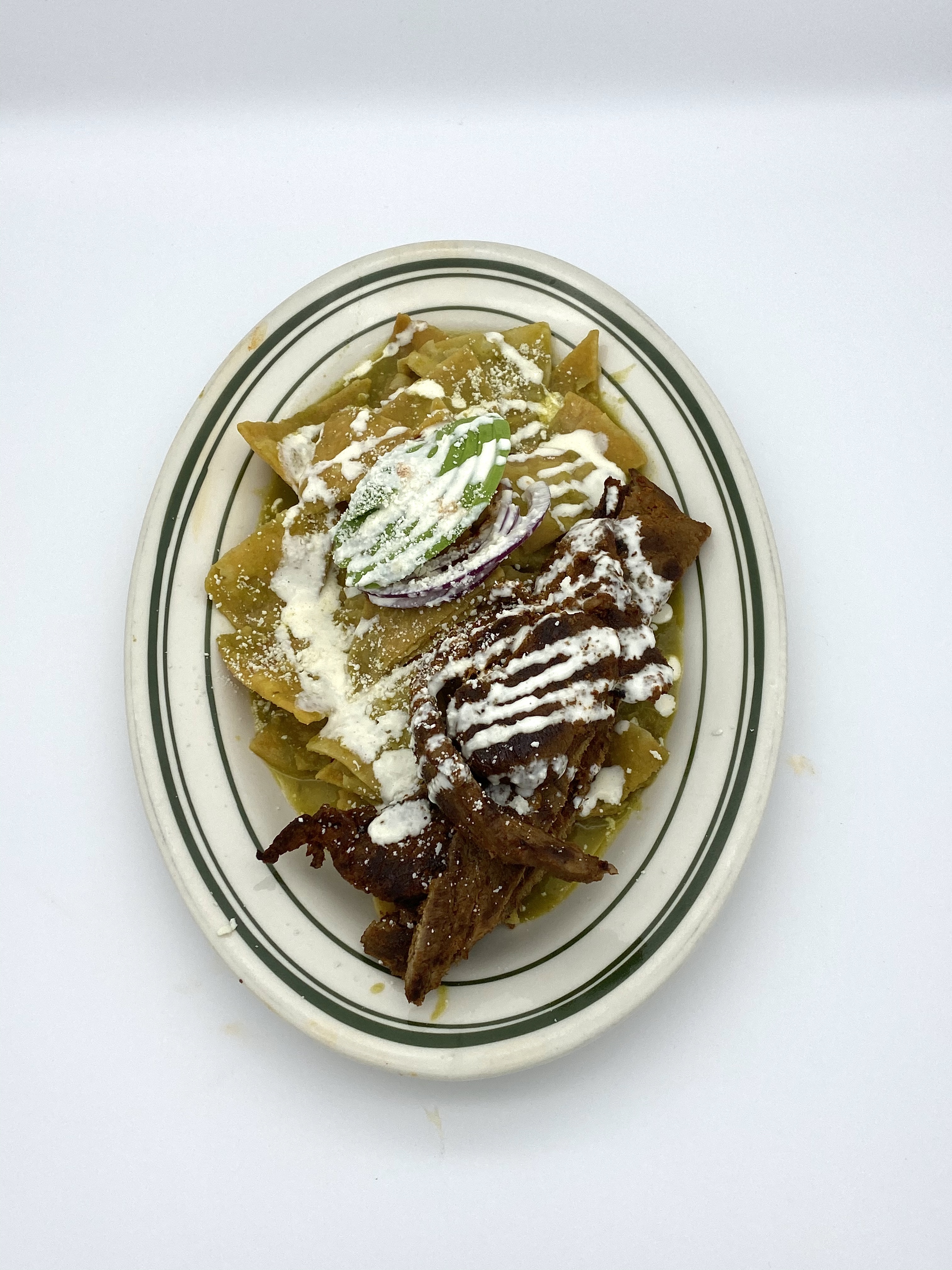 Order 40. Chilaquiles con salsa verde food online from Tacos Y Jugos Genesis store, Elmhurst on bringmethat.com