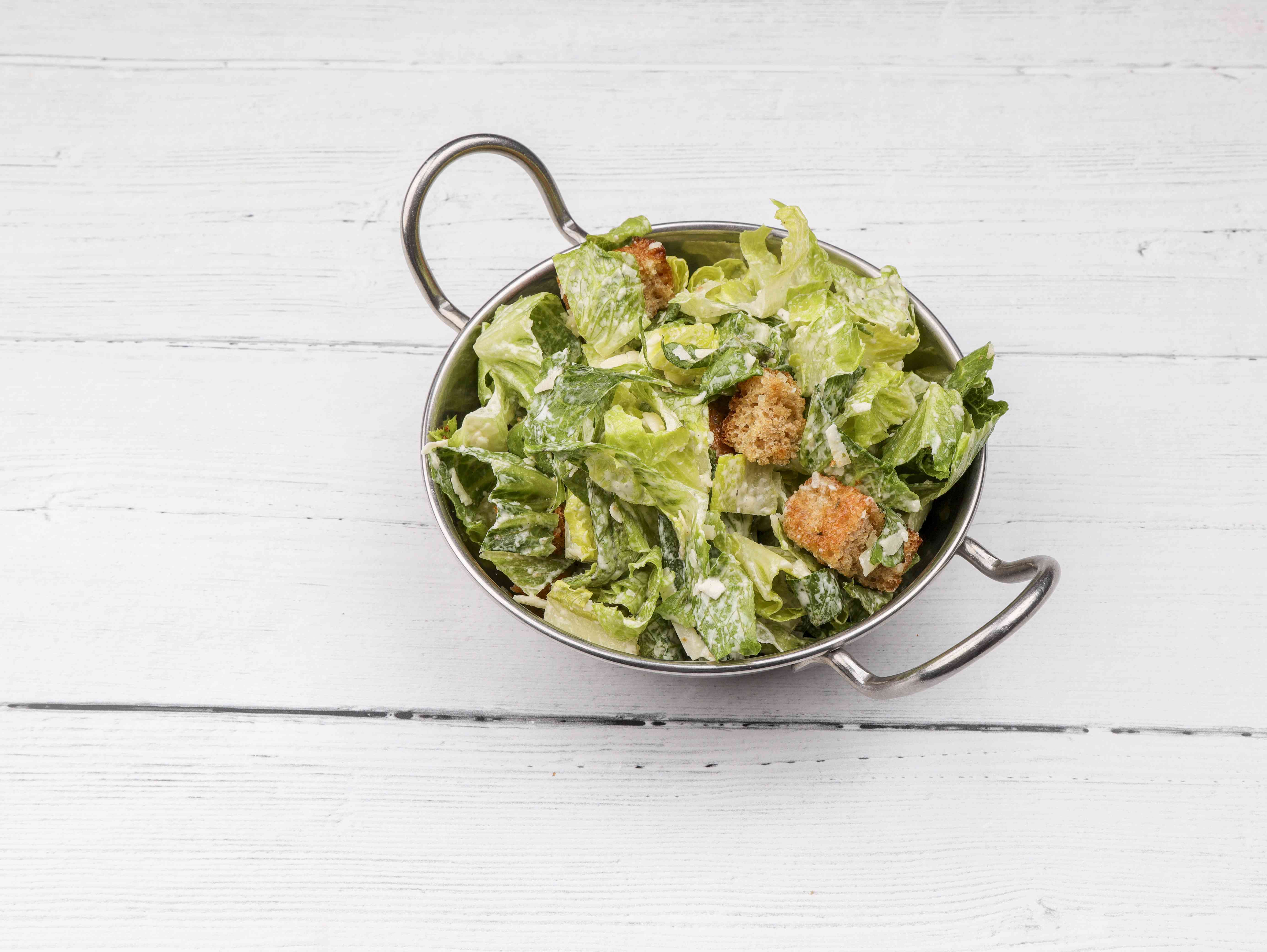 Order Caesar Salad food online from Greyhound Cafe store, Cedar Rapids on bringmethat.com