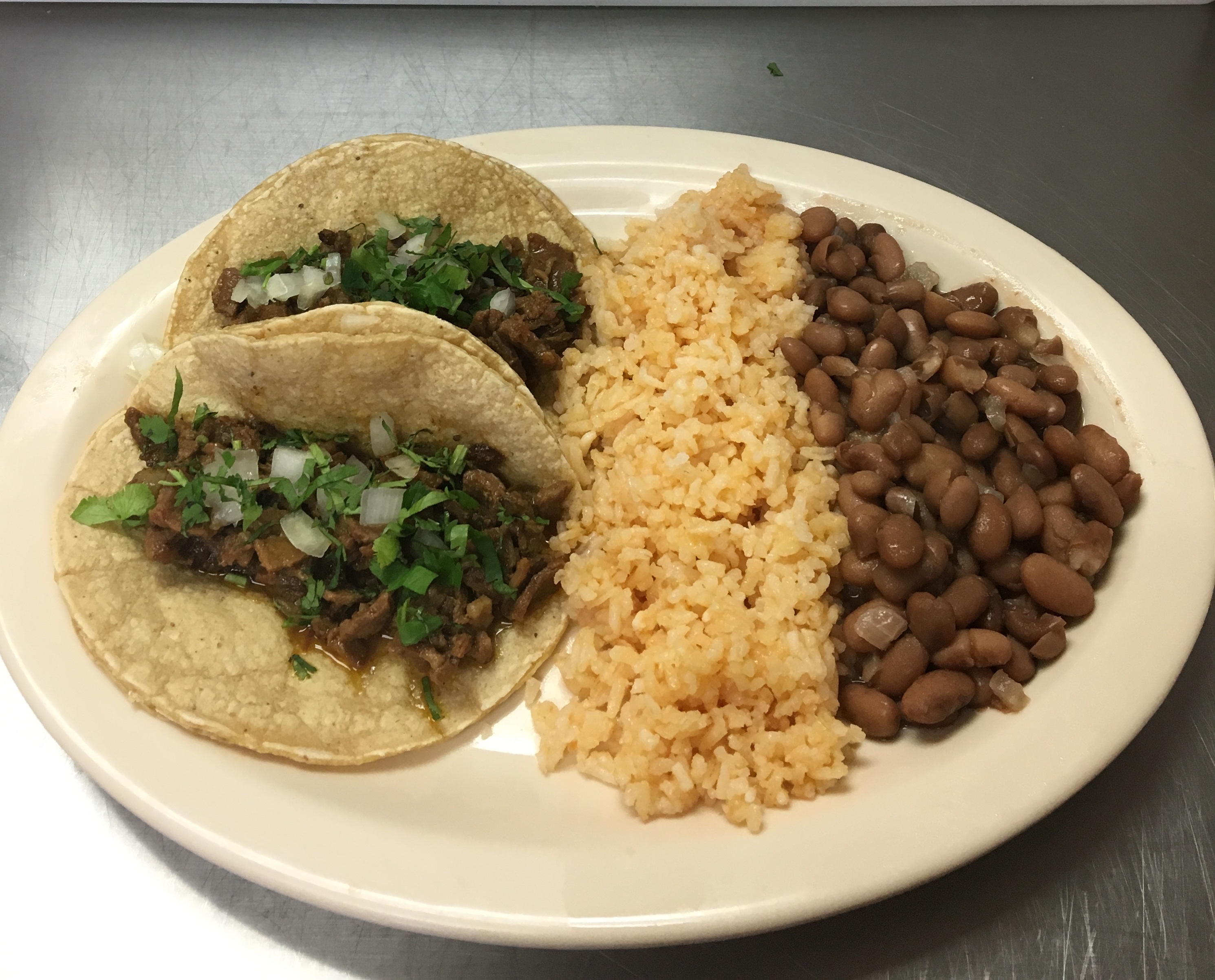 Order 3. 2 Tacos, Rice & Beans food online from El Rancho Mexican Grill - Cottage Grove Road store, Madison on bringmethat.com
