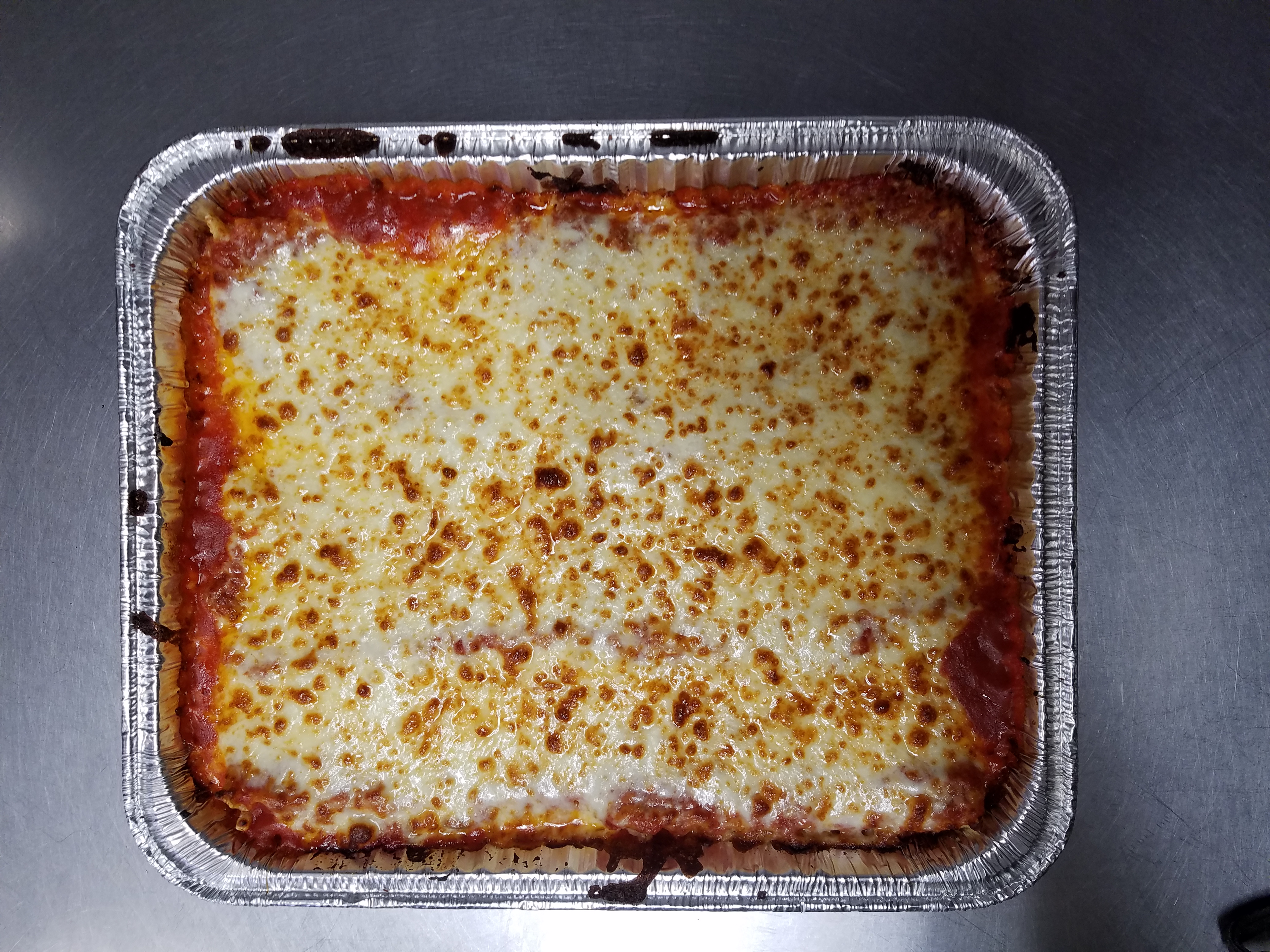 Order Tray of Baked Lasagna-BULK food online from Giovanni's Pizza Place store, Charleston on bringmethat.com