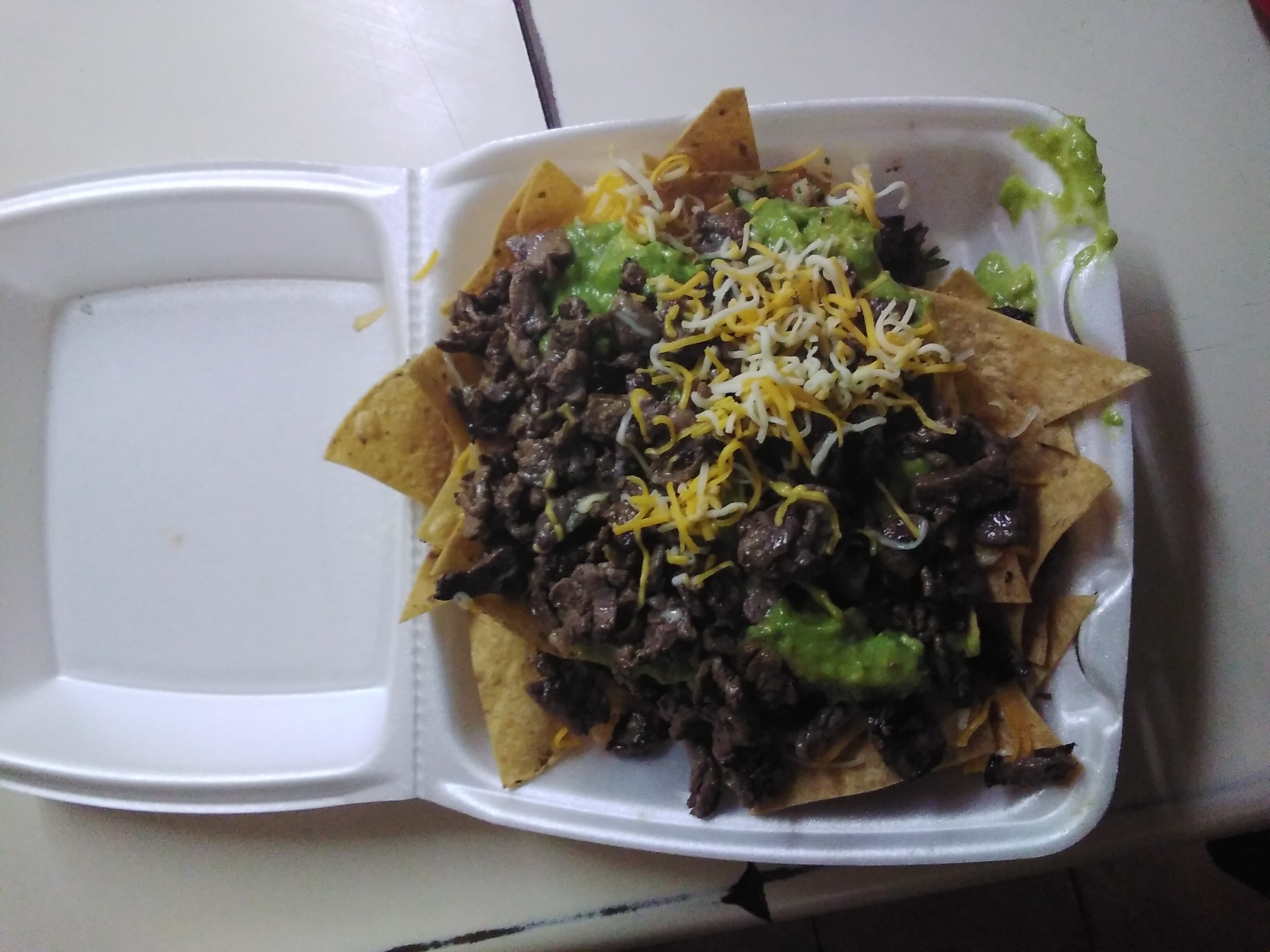 Order Carne Asada Chips food online from Rolberto Taco Shop store, San Diego on bringmethat.com