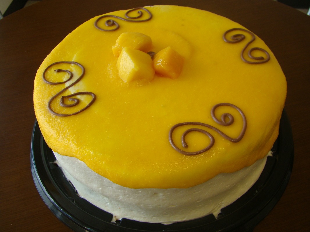 Order Mango Delight food online from Capricious Cake Shop store, Pharr on bringmethat.com