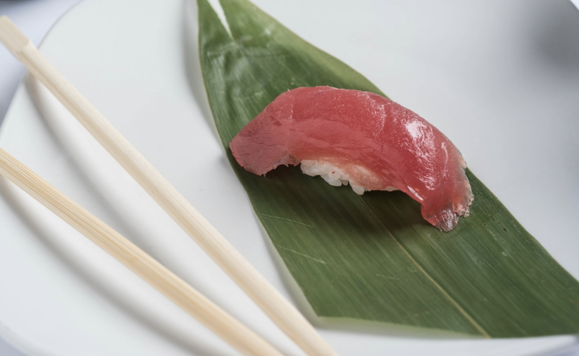 Order Tuna Nigiri food online from Ichiban Golden Dragon store, South Bend on bringmethat.com