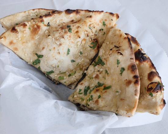 Order Garlic naan food online from Persis Indian Grill store, Monroe Township on bringmethat.com