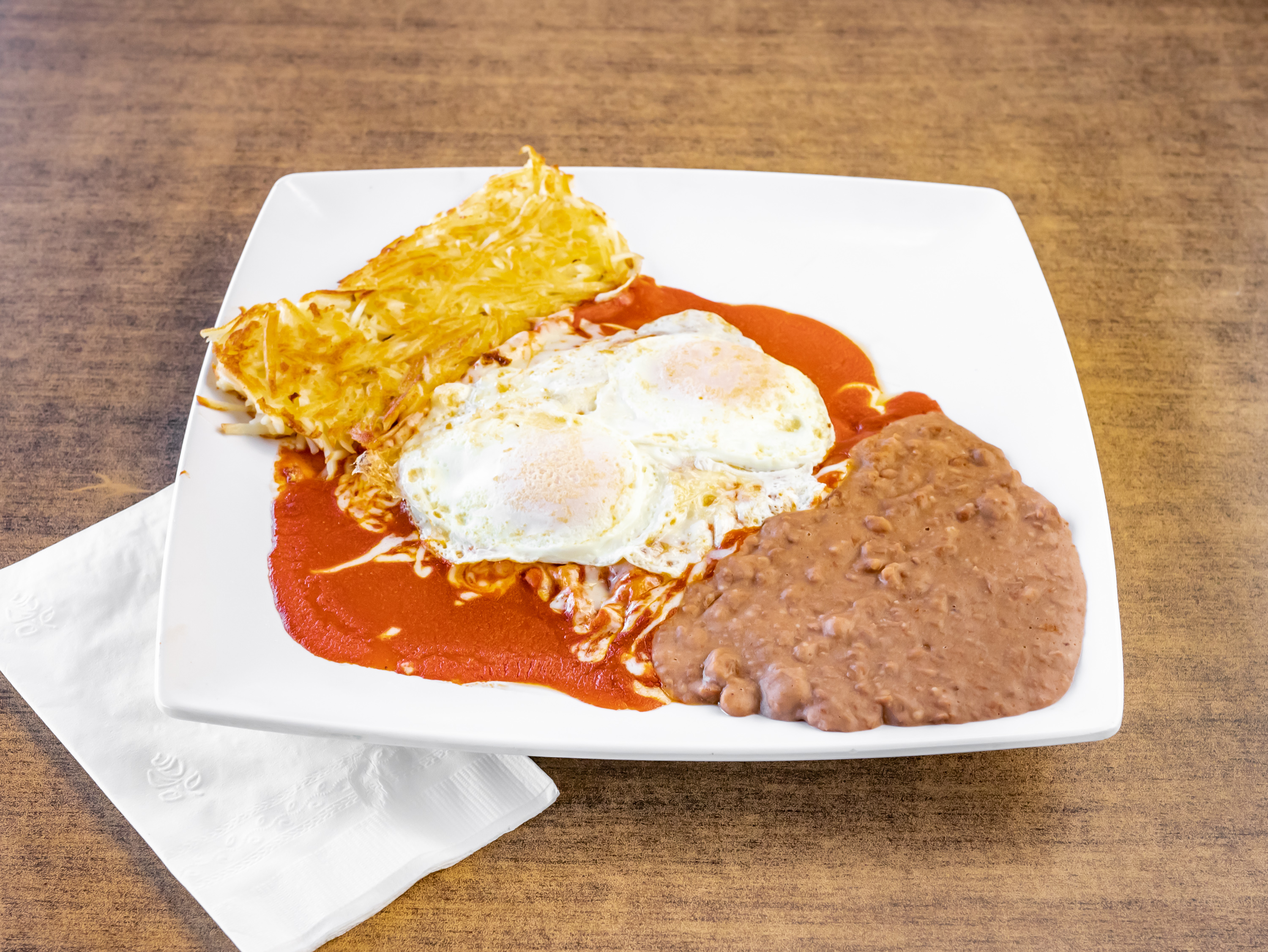 Order Enchiladas Montadas Breakfast food online from Good Coffee store, El Paso on bringmethat.com
