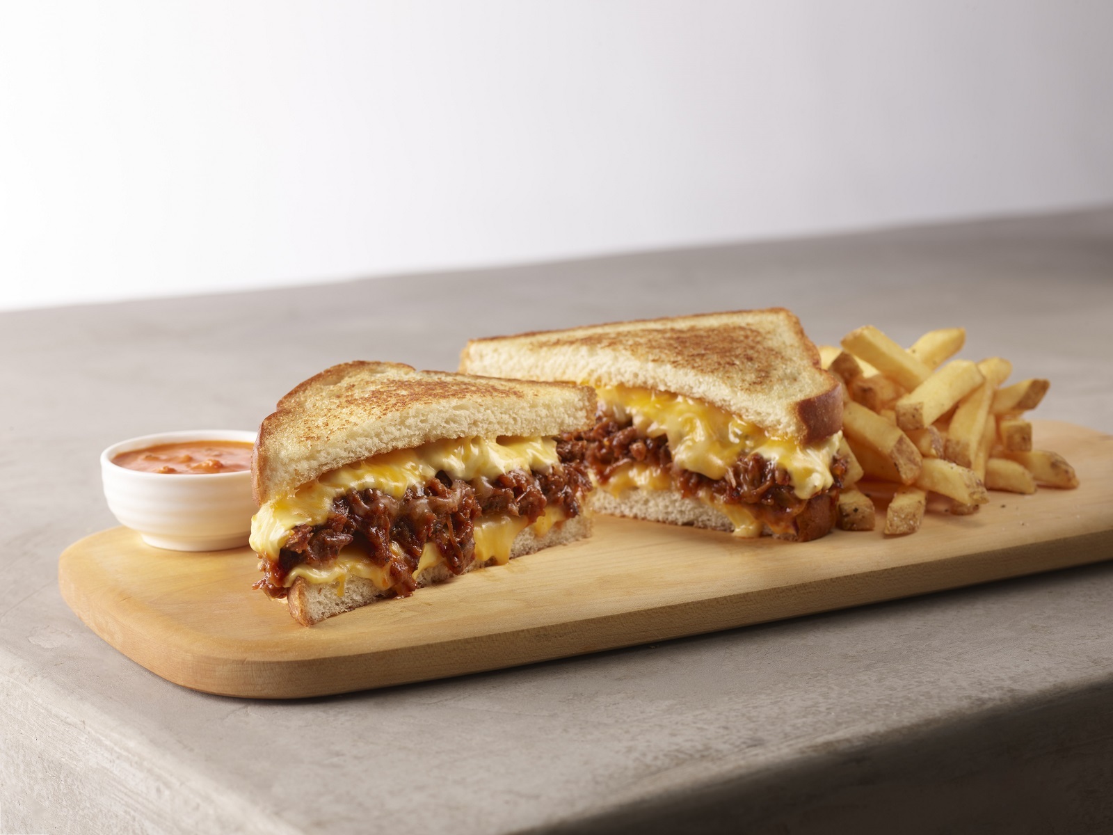 Order Brisket Stuffed Grilled Cheese food online from Smokey Bones Barbeque and Grill store, Mentor on bringmethat.com