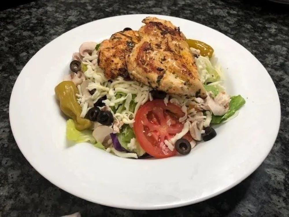 Order Caesar Salad with Grilled Chicken - Salad food online from Bellissimo store, Colleyville on bringmethat.com