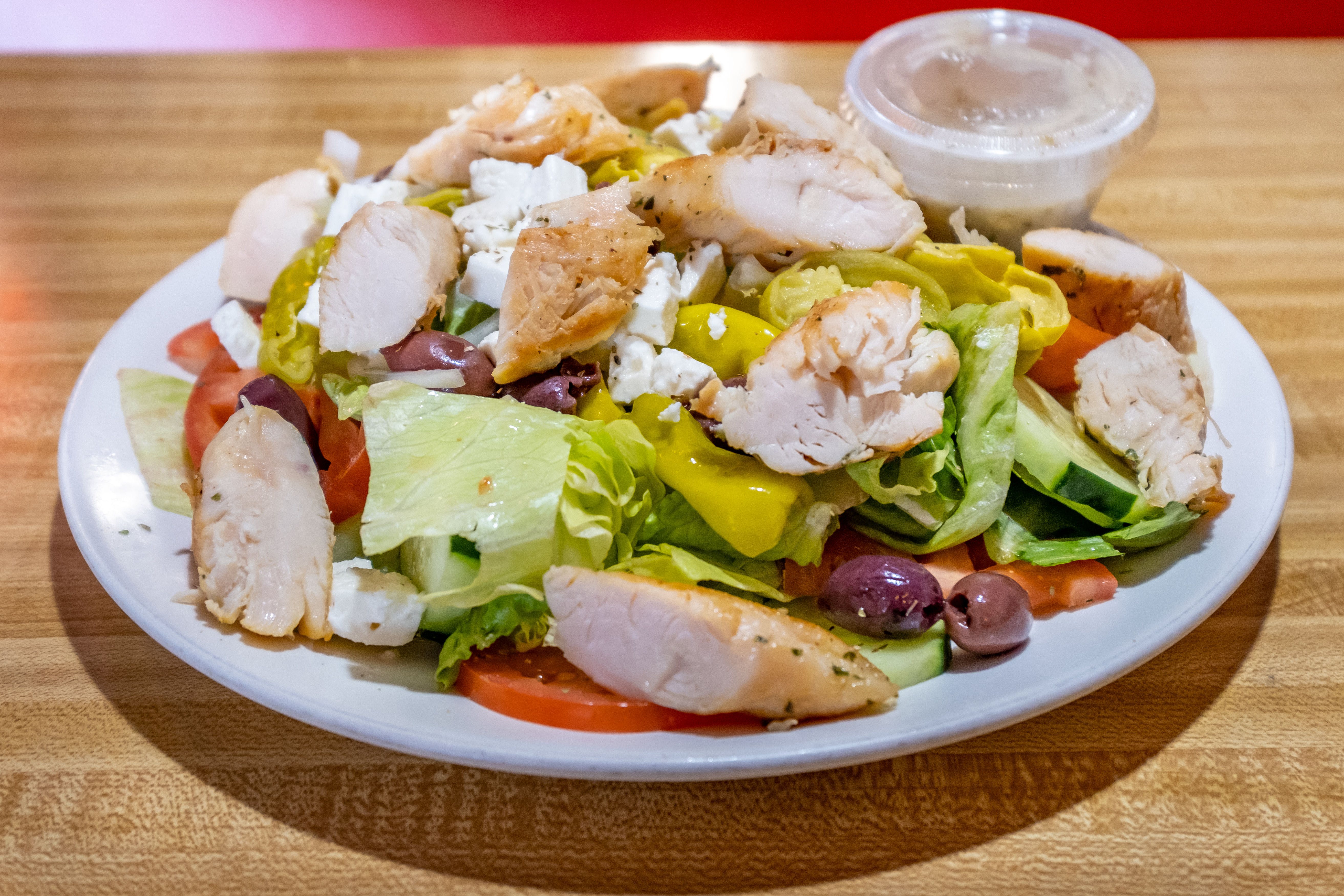 Order Greek Salad - Salad food online from Brother's Pizza store, Shippensburg on bringmethat.com