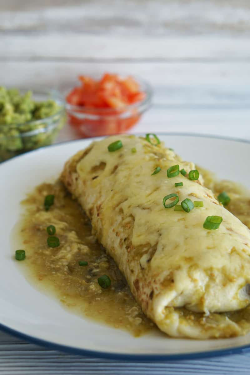 Order CHILE VERDE BURRITO LUNCH  WITH RICE BEANS & CHEESE INSIDE food online from El Taco Chico store, Oak Park on bringmethat.com