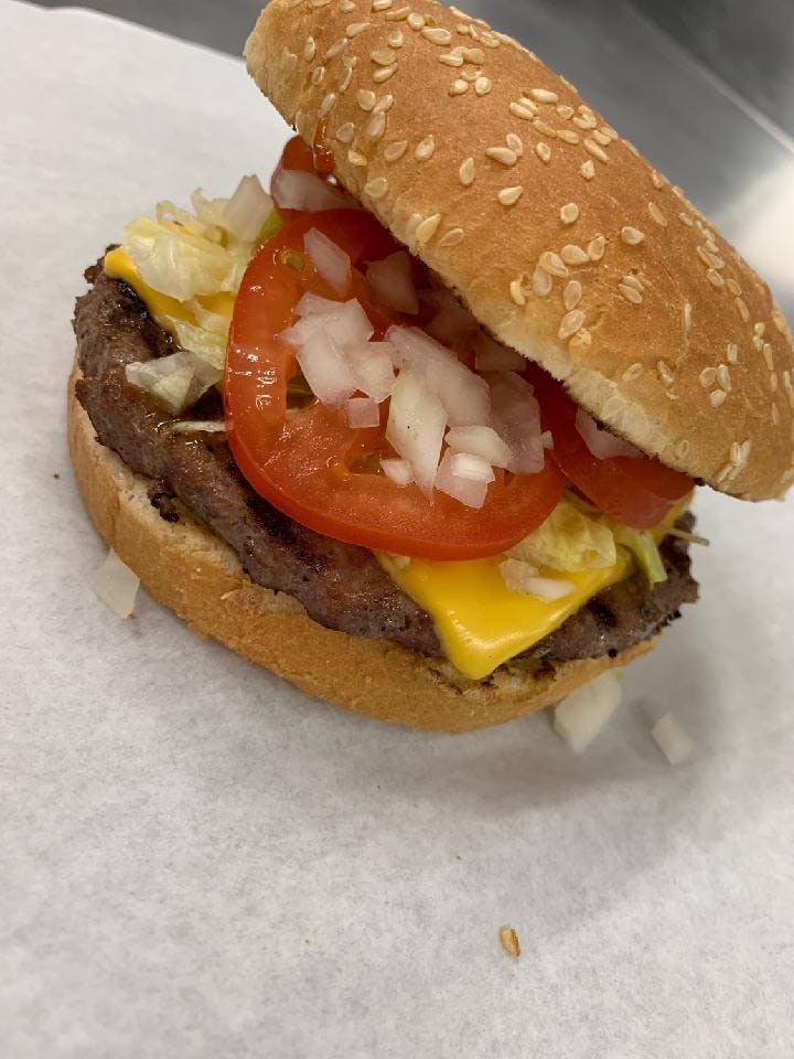 Order Cheeseburger - Single 1/3 lb. food online from Mario's Pizza store, Northbrook on bringmethat.com