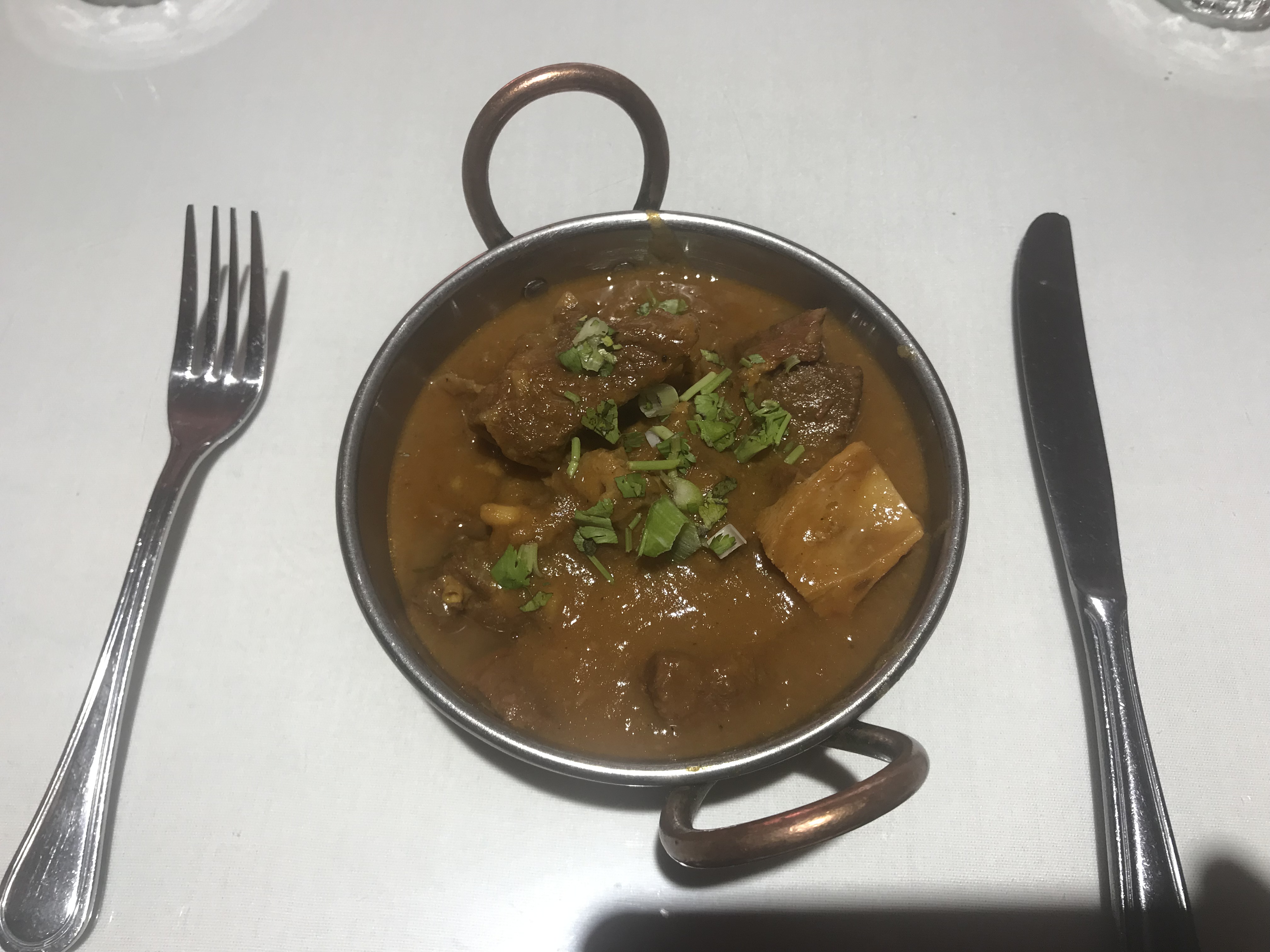 Order Goat Curry food online from Desi Dhaba store, Cambridge on bringmethat.com