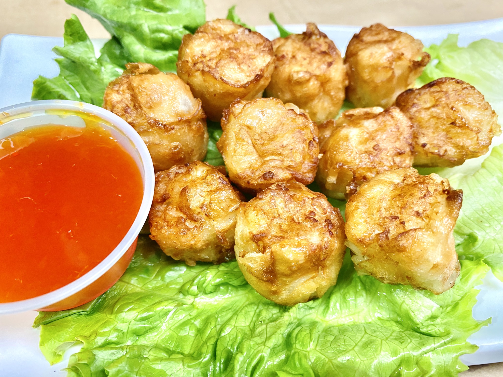 Order Fried Shrimp Shumai (10 piece) food online from Min Min Asian Cafe store, Chicago on bringmethat.com