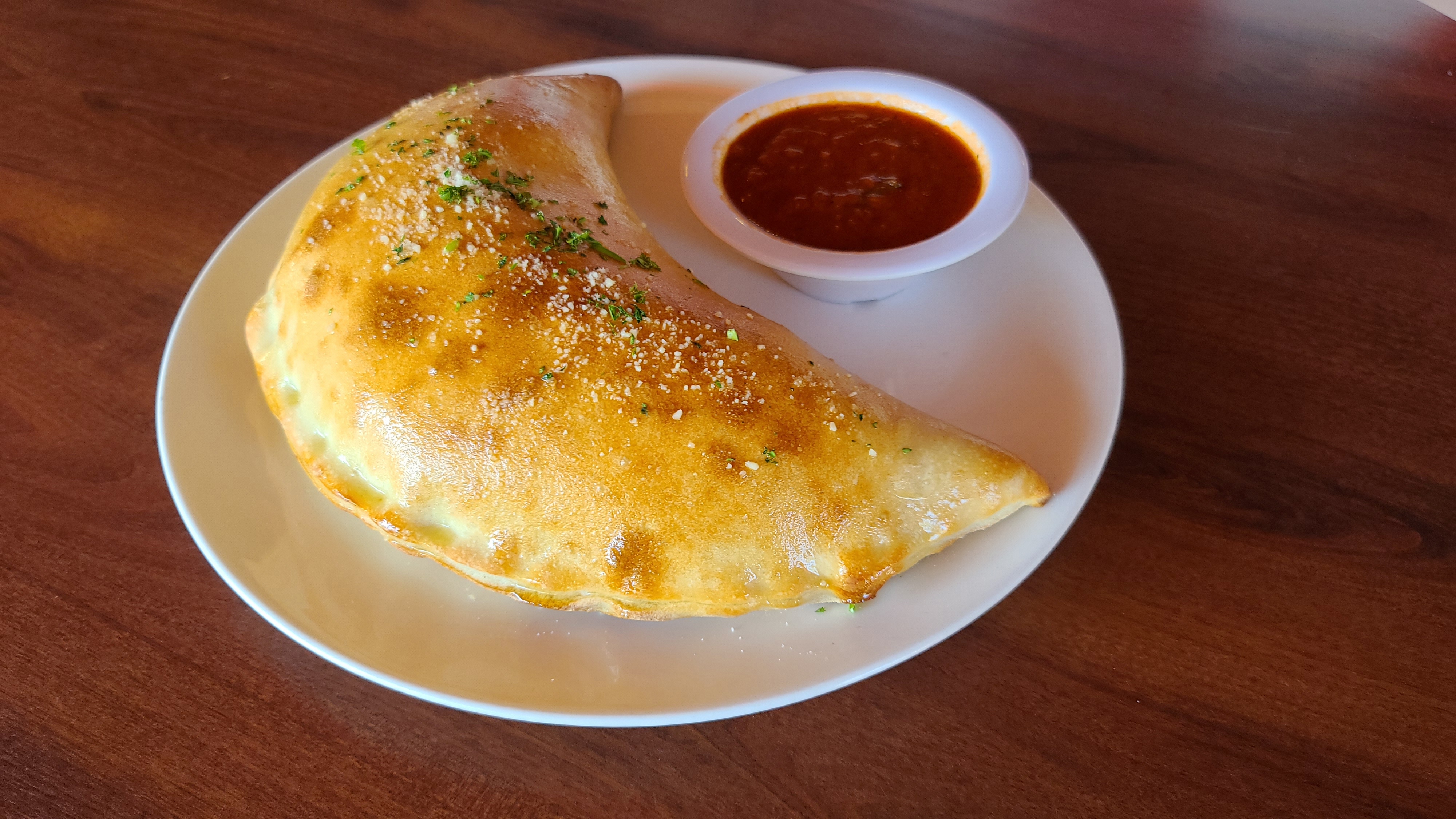Order Ham, Pineapple and Cheese Calzone food online from Italian Cafe store, Irving on bringmethat.com