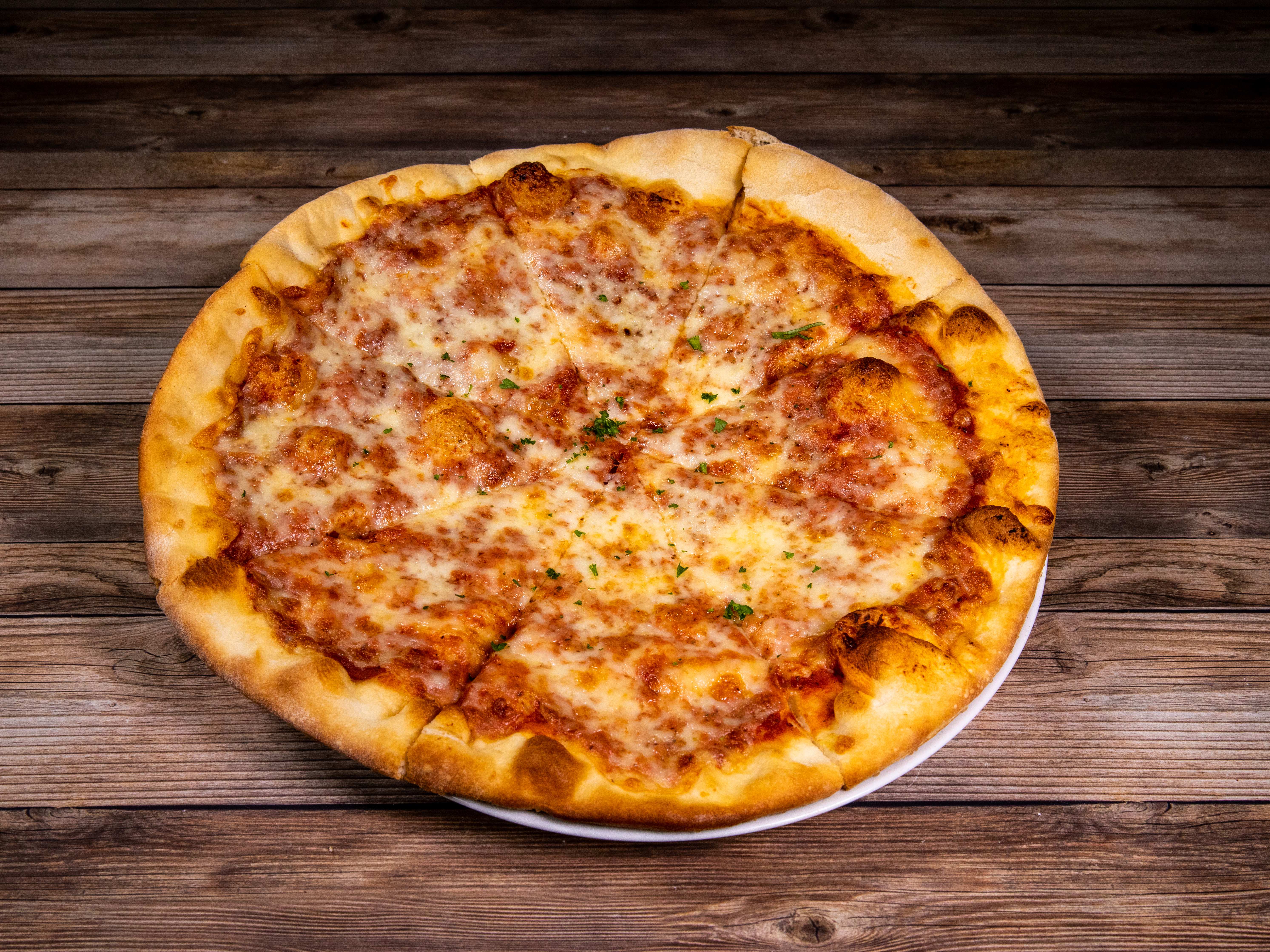 Order Cheese Pizza food online from Eddie Napolis store, Garland on bringmethat.com