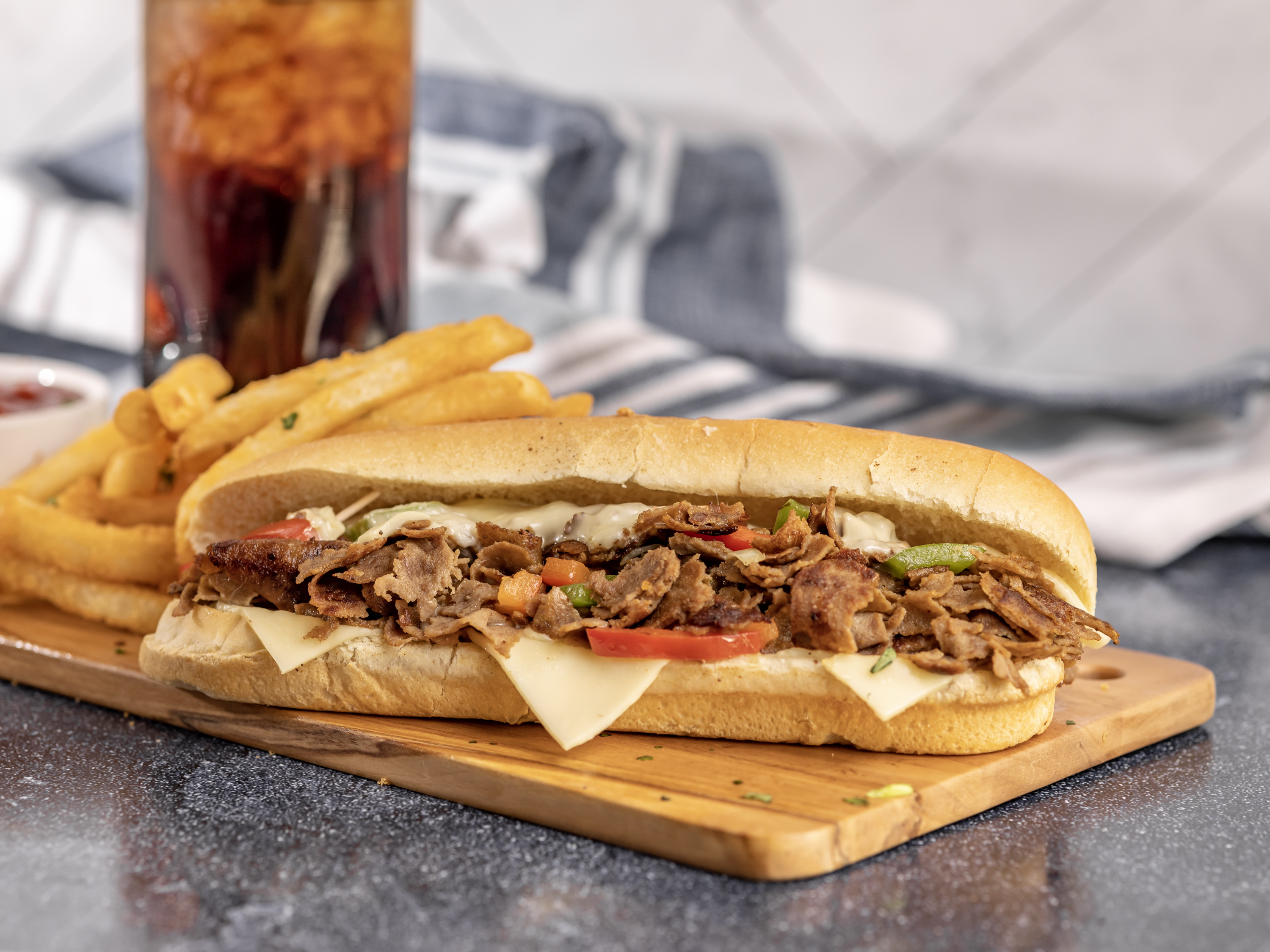 Order Philly Cheesesteak Sandwich food online from Hooks Fish and Chips store, Minneapolis on bringmethat.com