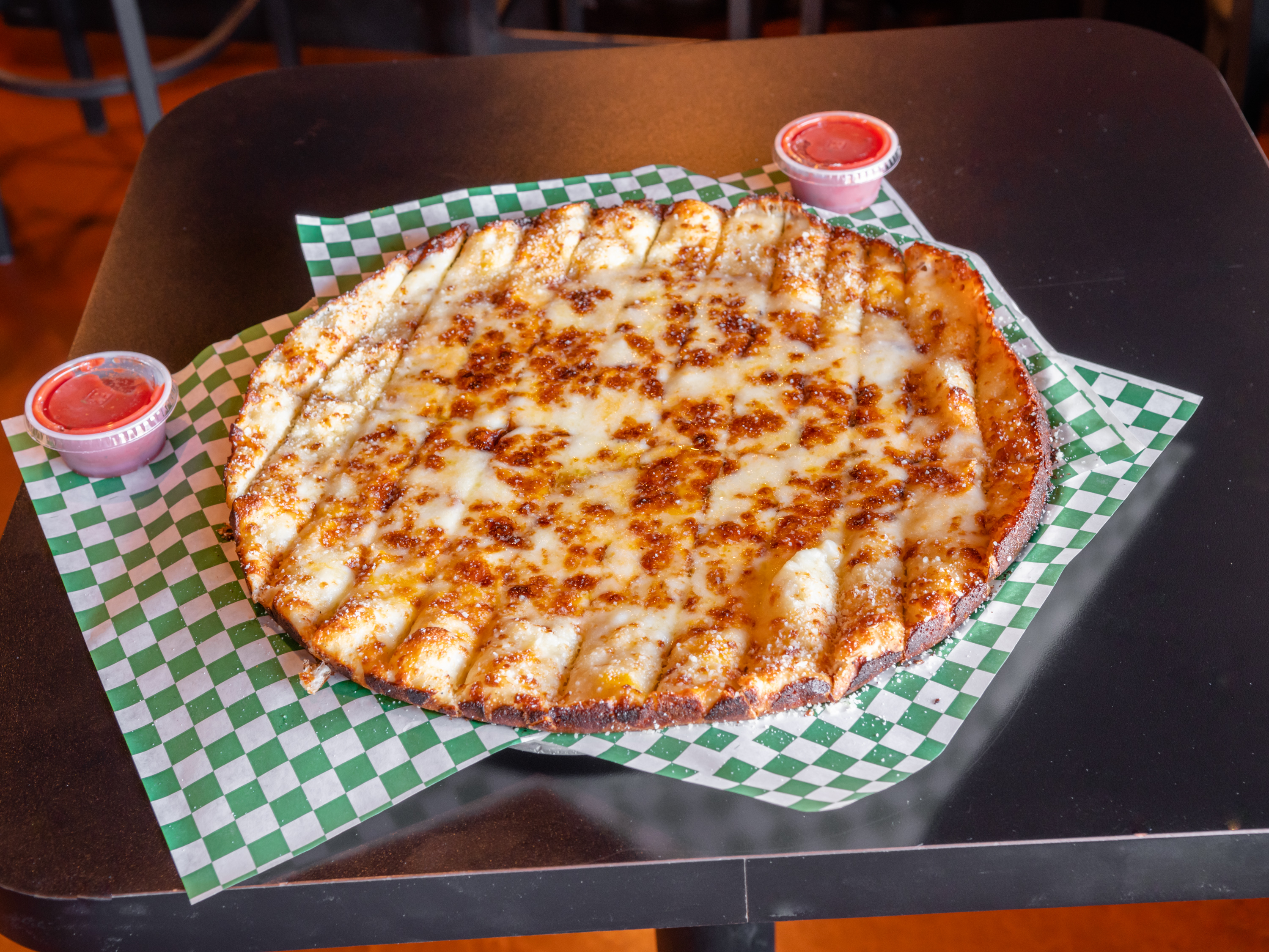 Order Cheesy Bread Stix food online from Geno's Giant Slice store, Gilbert on bringmethat.com
