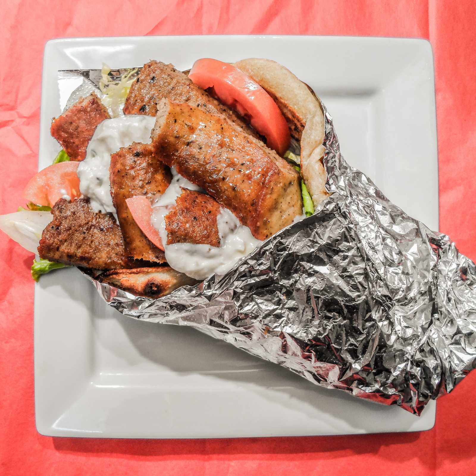 Order 19. Gyro Sandwich food online from Grill Kabob Xpress store, Old Town Manassas on bringmethat.com