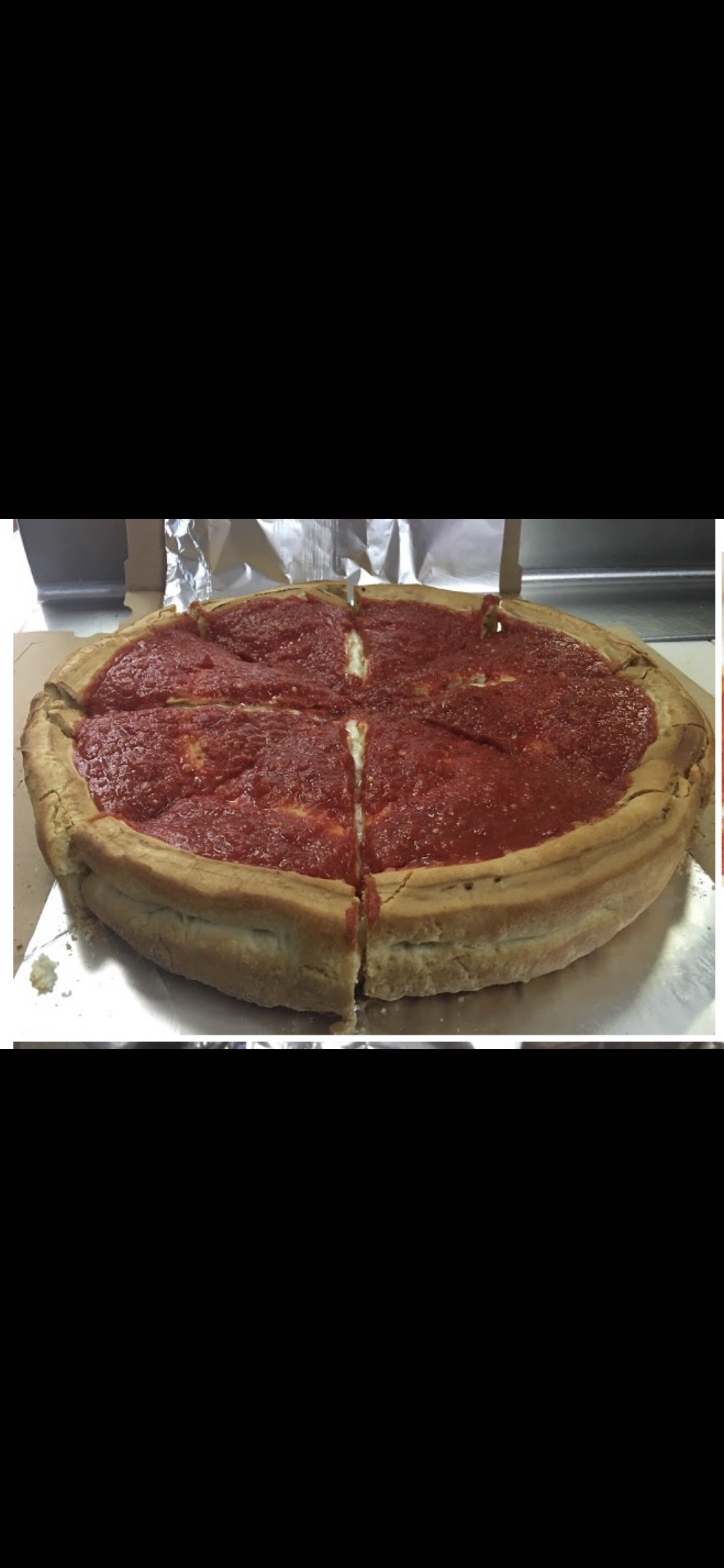 Order Large 14" Stuffed Cheese Pizza food online from Victors Pizza store, Chicago on bringmethat.com