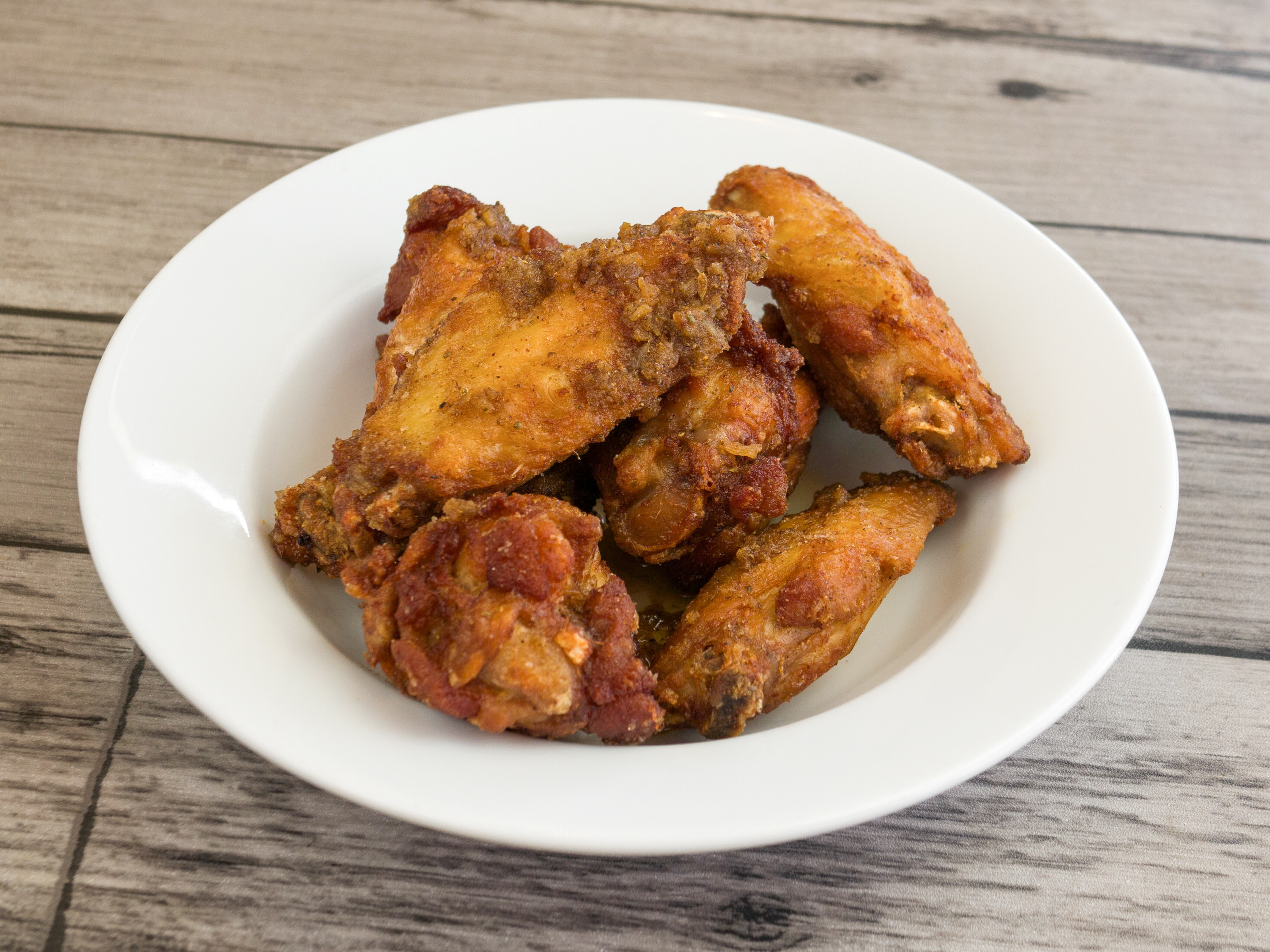Order A12. Cajun-Asian Wings food online from Crazy Wok store, Houston on bringmethat.com