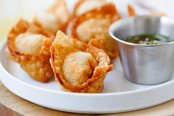 Order 6. Pork Fried Wontons(10) food online from Chen's Yummy House store, Dumont on bringmethat.com