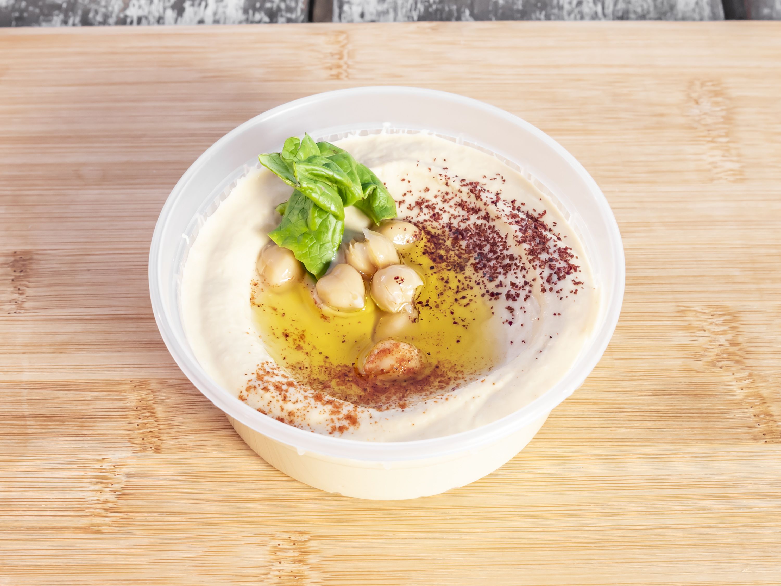 Order 1. Hummus food online from Jad Mediterranean Grill store, Austin on bringmethat.com