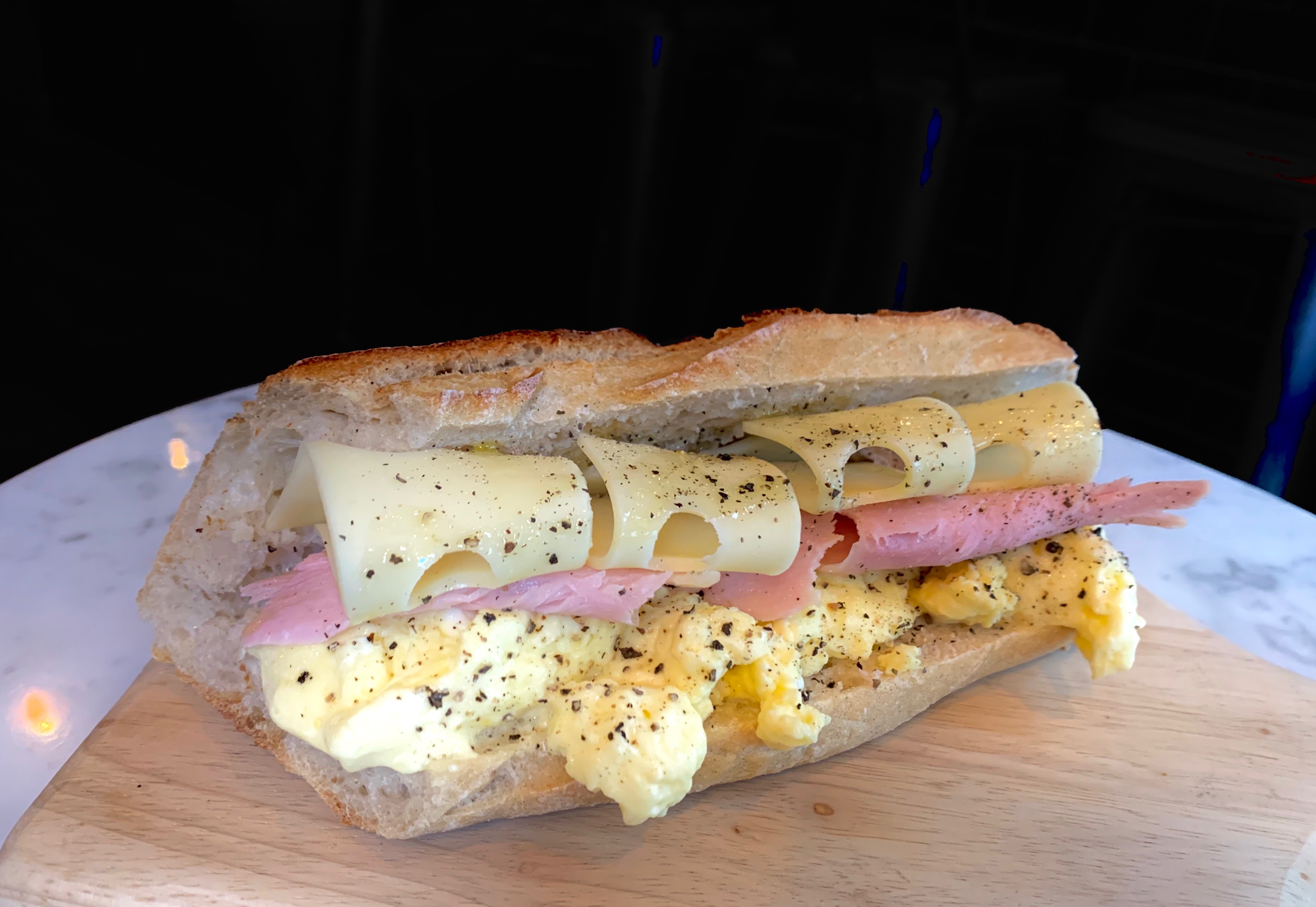 Order Breakfast Sandwich with Eggs and Ham and cheese food online from Lena Cafe store, New York on bringmethat.com