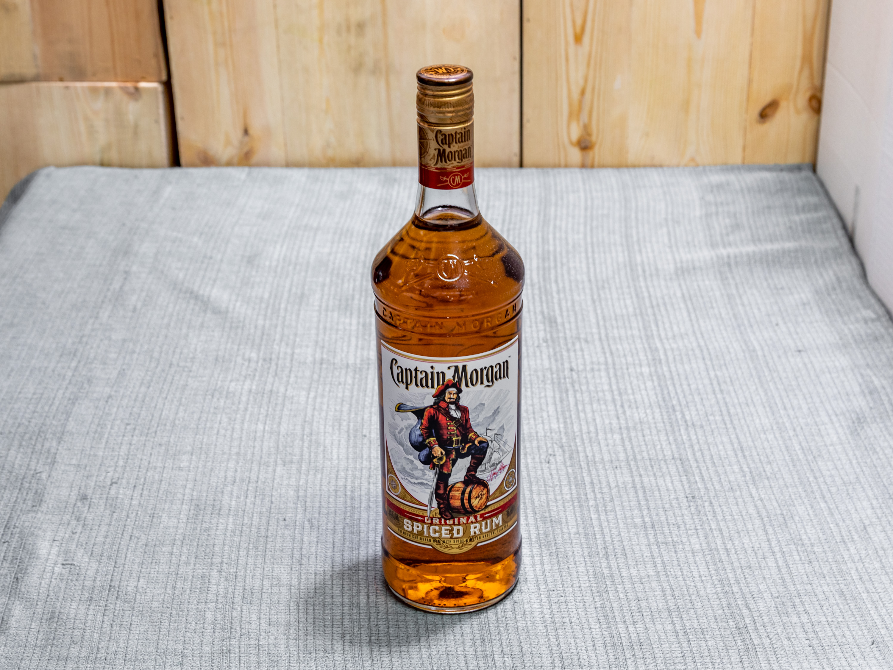 Order Captain Morgan's Spiced 1 Liter food online from West Islip Wines & Liquors store, West Islip on bringmethat.com