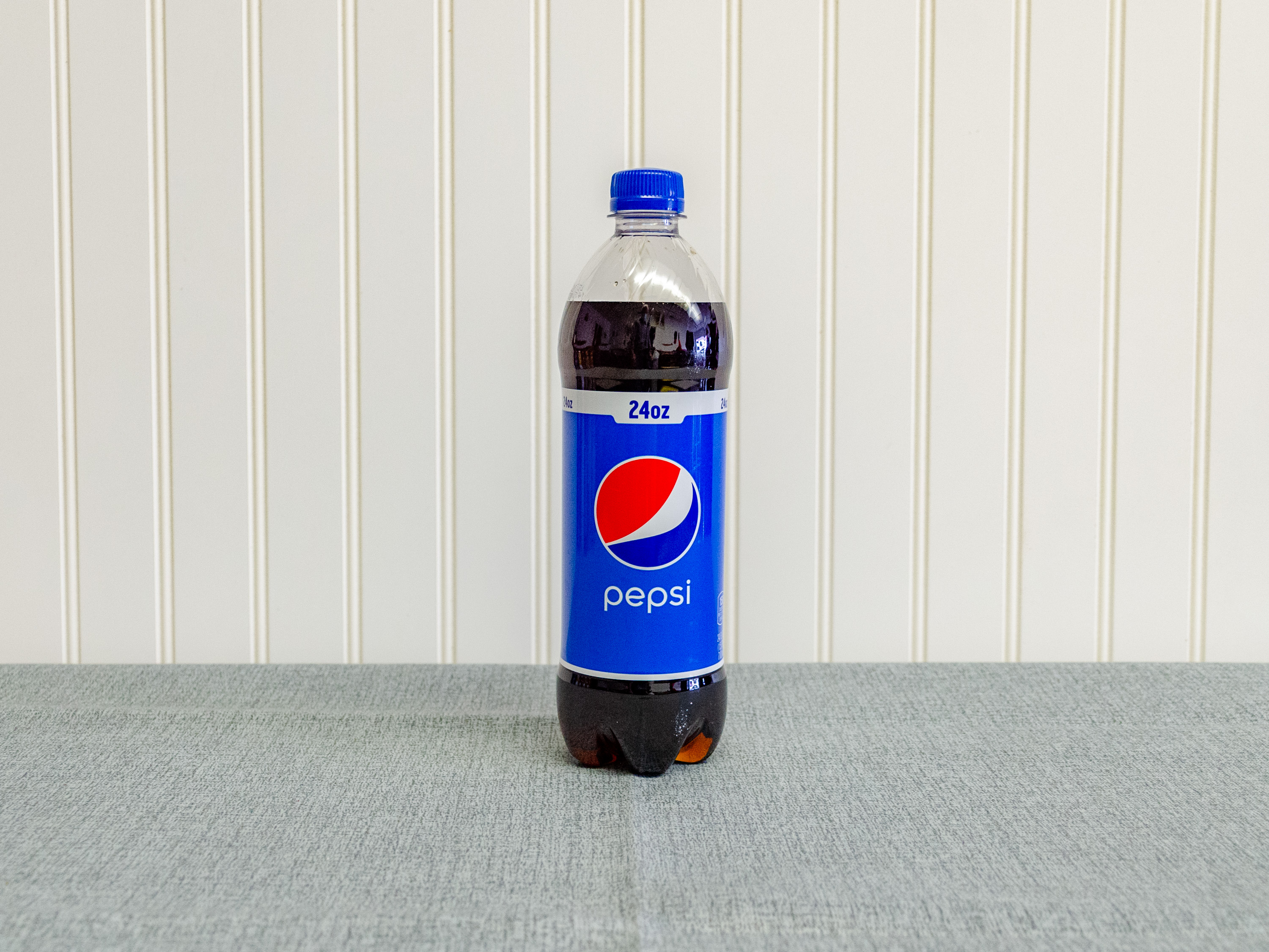 Order 24 oz. Pepsi  food online from Just Dash It store, Englewood on bringmethat.com