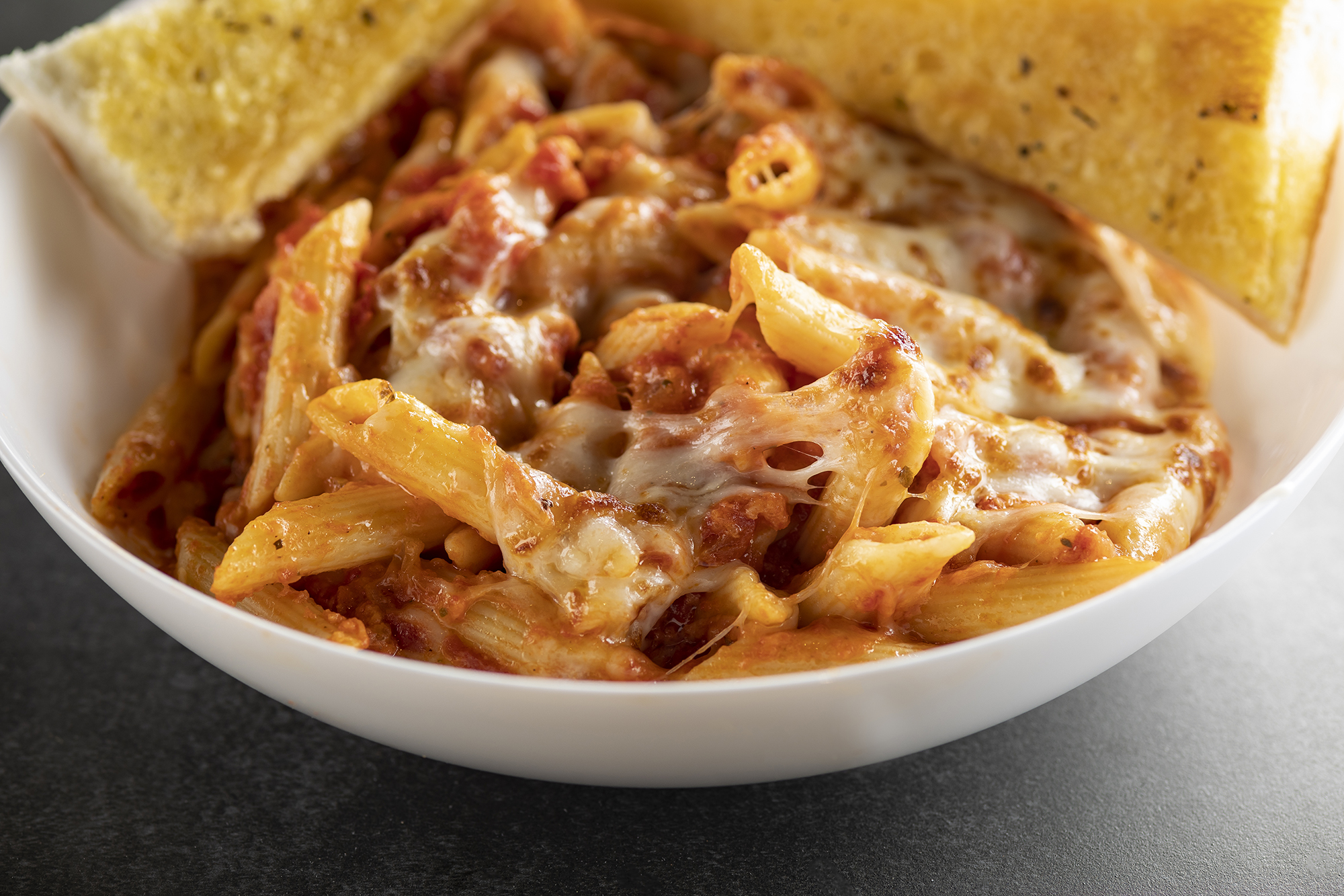 Order Baked Mostaccioli Individual Pasta food online from Papa Saverios Pizzeria store, West Chicago on bringmethat.com