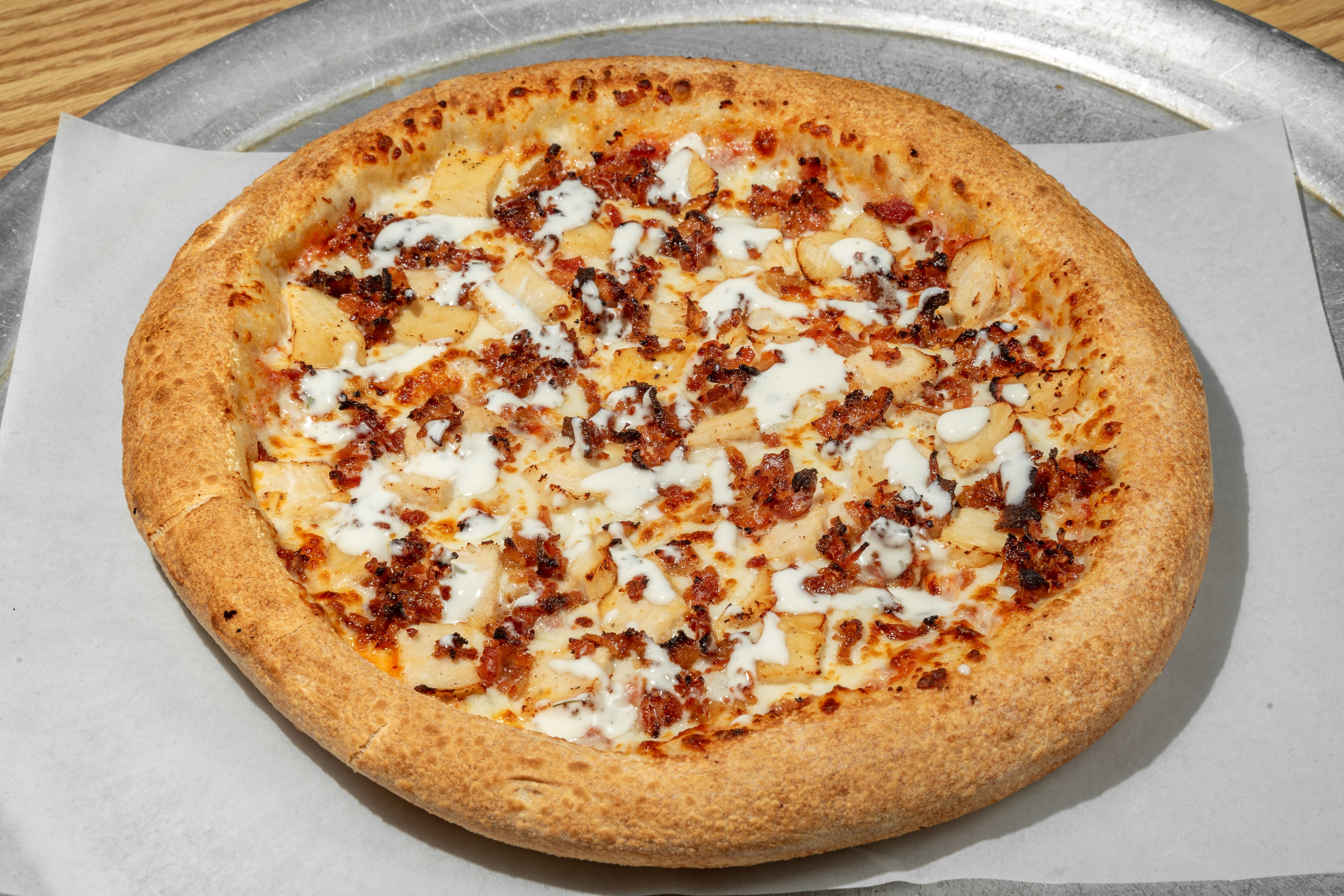 Order Chicken Bacon Ranch Pizza - Small 10'' food online from Rockyanos Pizza store, Dallas on bringmethat.com