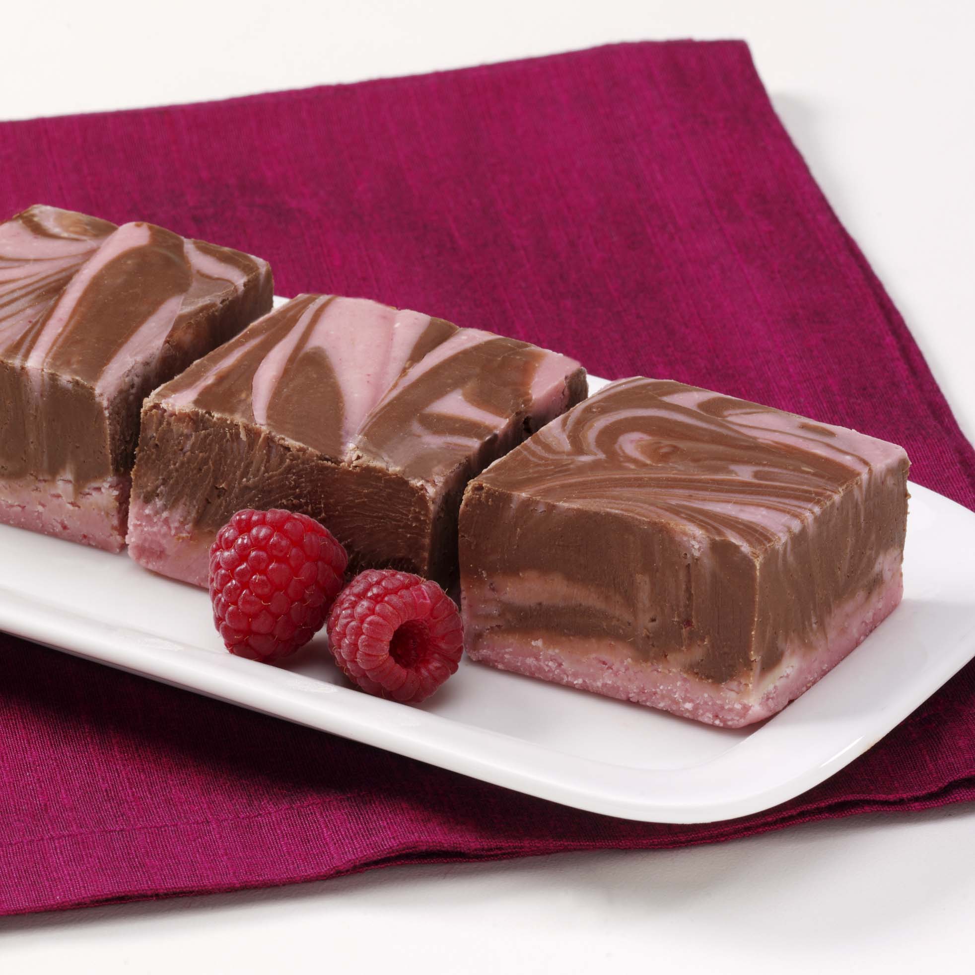 Order Raspberry Chocolate Swirl Fudge food online from Russell Stover Chocolates store, Omaha on bringmethat.com