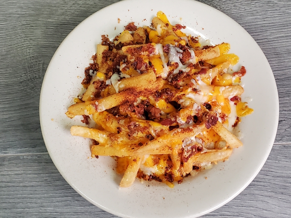Order Shakin’ Bacon Cheese Fries food online from Red Hot & Blue store, North Richland Hills on bringmethat.com