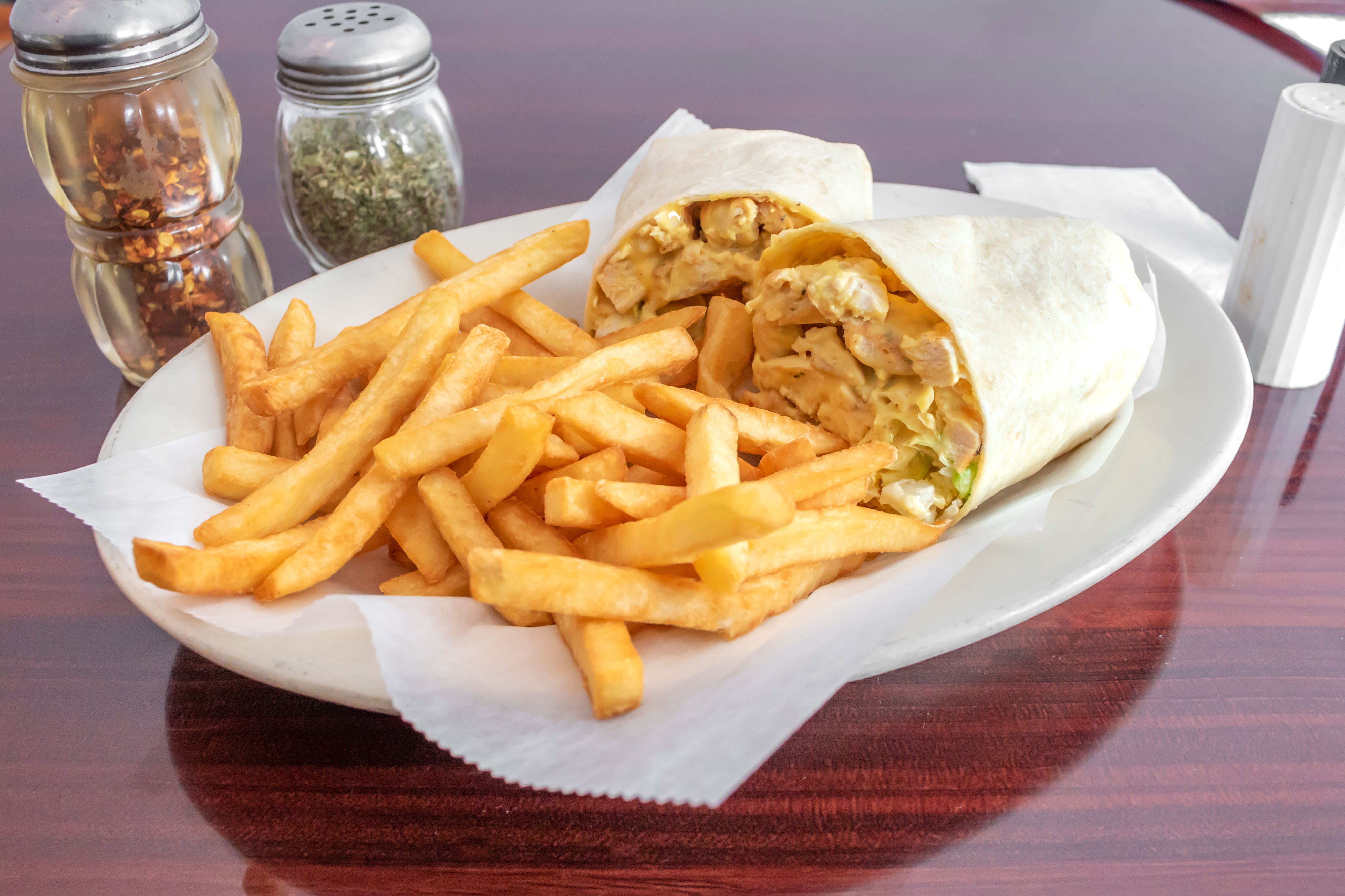 Order Honey Mustard Grilled Chicken Wrap - Wrap food online from Dominics Pizza and Restaurant store, Lawrence Township on bringmethat.com