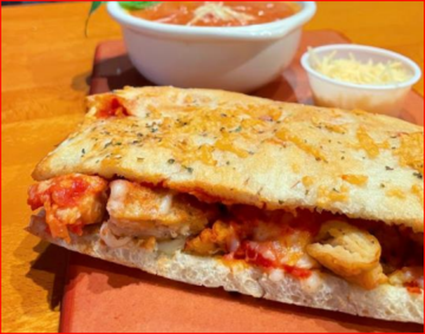 Order Chicken Parmesan Melt on Parmesan Herb Bread food online from Cosi store, New York on bringmethat.com