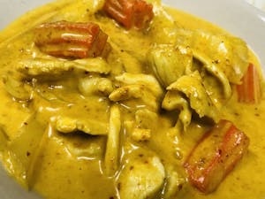Order Yellow Curry food online from Tamarind Thai Cuisine store, Camarillo on bringmethat.com