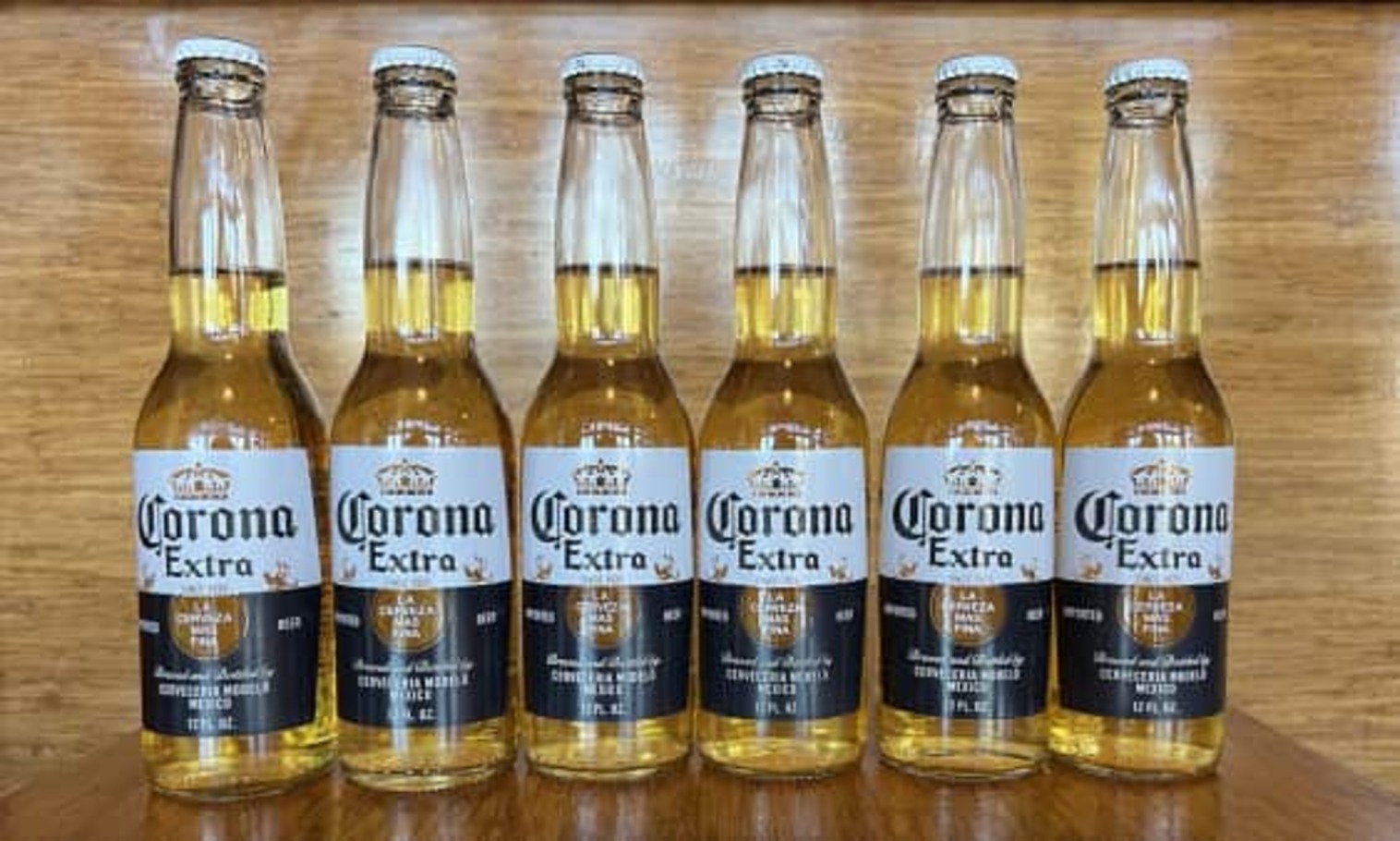 Order Corona - 6pk food online from The Post Sports Bar & Grill store, Creve Coeur on bringmethat.com