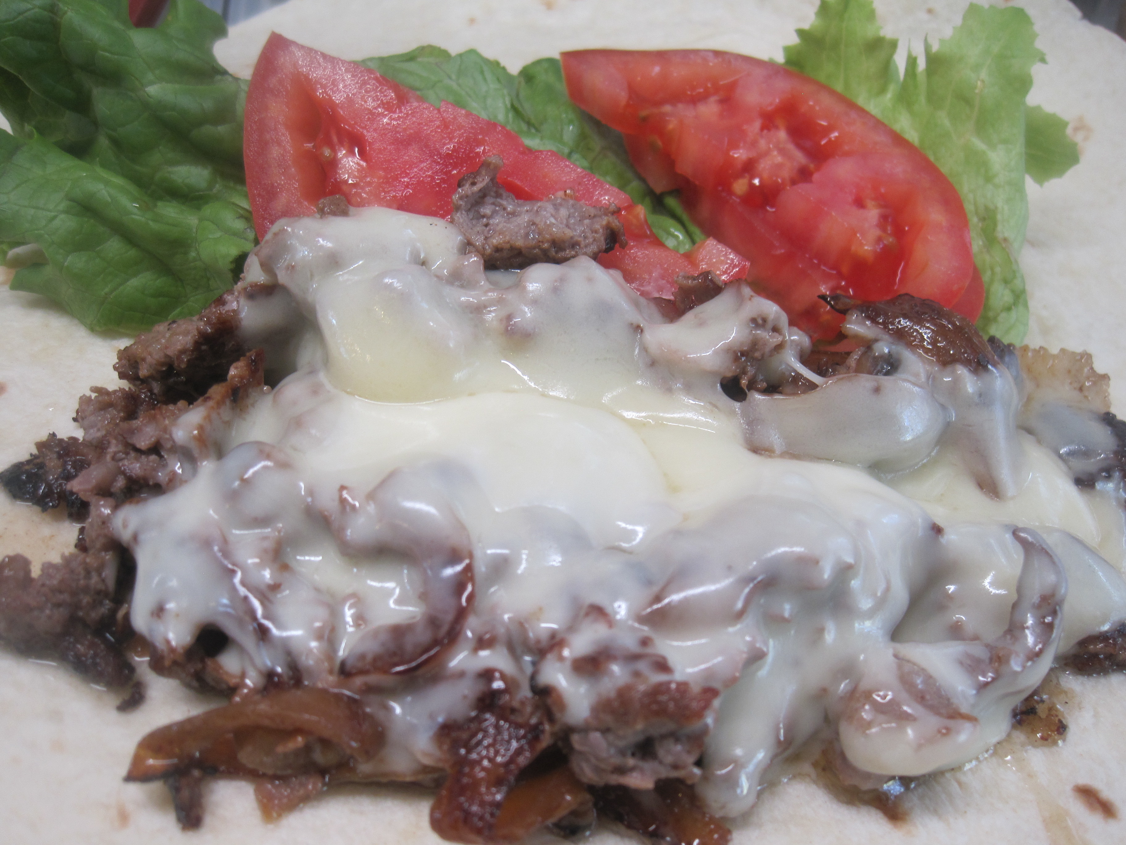 Order Philly Cheese Steak Wrap food online from La Bakery store, Carson City on bringmethat.com
