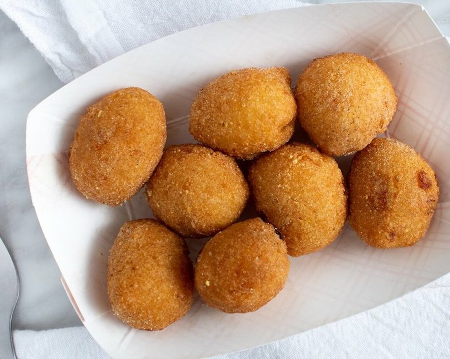 Order SIDE HUSHPUPPIES. food online from Hook Fish & Chicken store, Baton Rouge on bringmethat.com