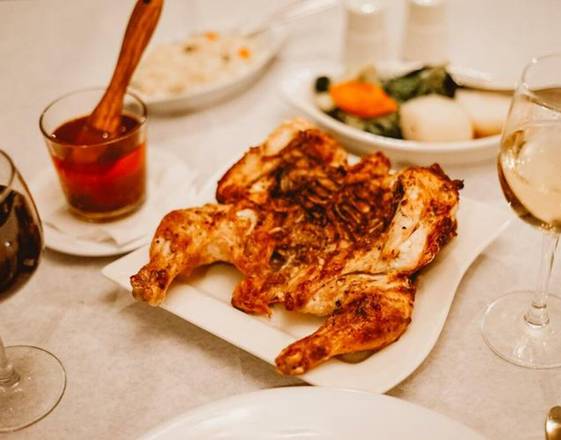 Order Whole BBQ Chicken food online from Churrasqueira Brasa Rodizio store, Mineola on bringmethat.com